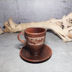 Pottery cup with saucer Handmade from red clay Coffee cup