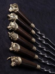 Gift set of skewers with wooden handle.