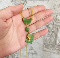 Handmade pendant on a chain. Handmade jewelry.