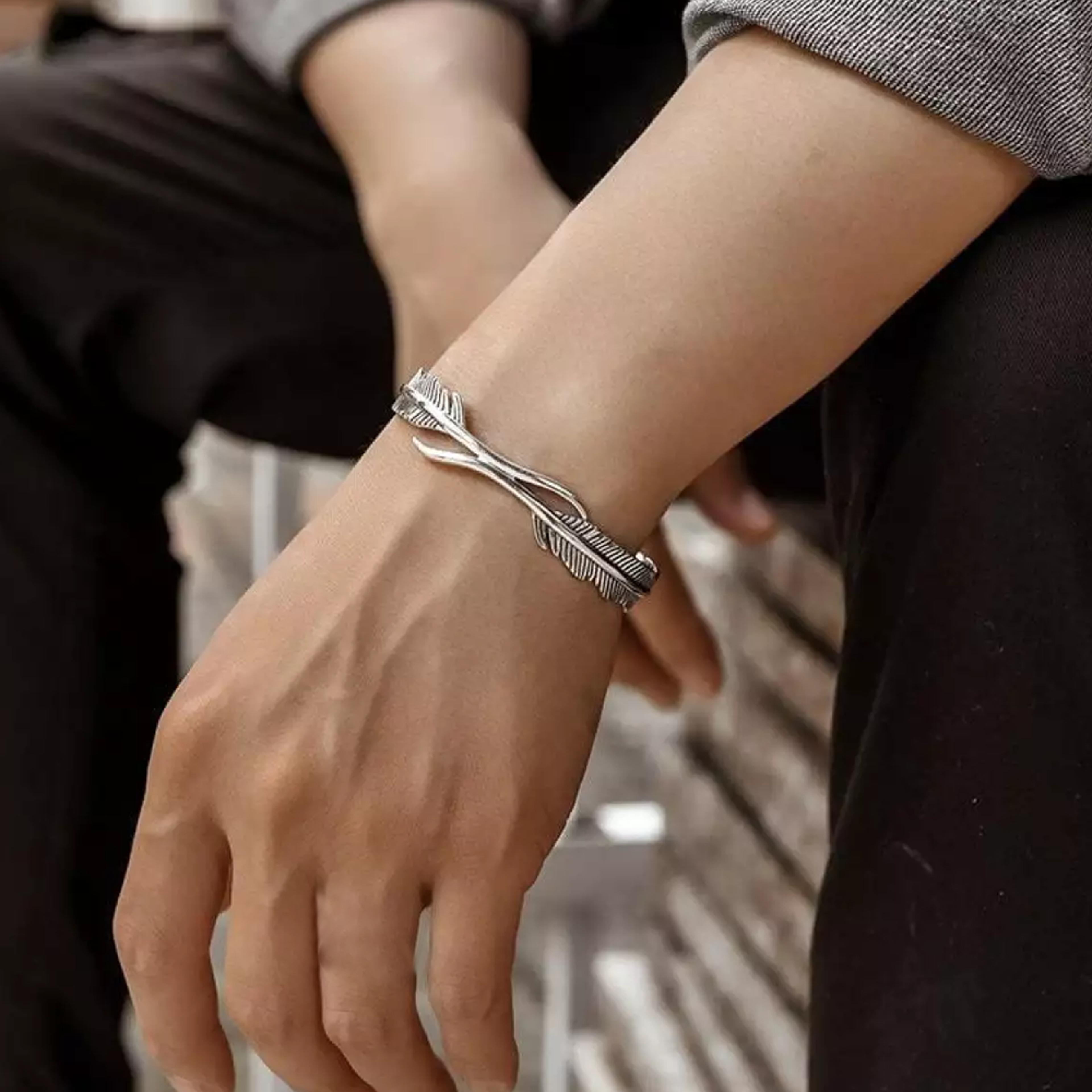 adjustable symbolic silver feather bracelet