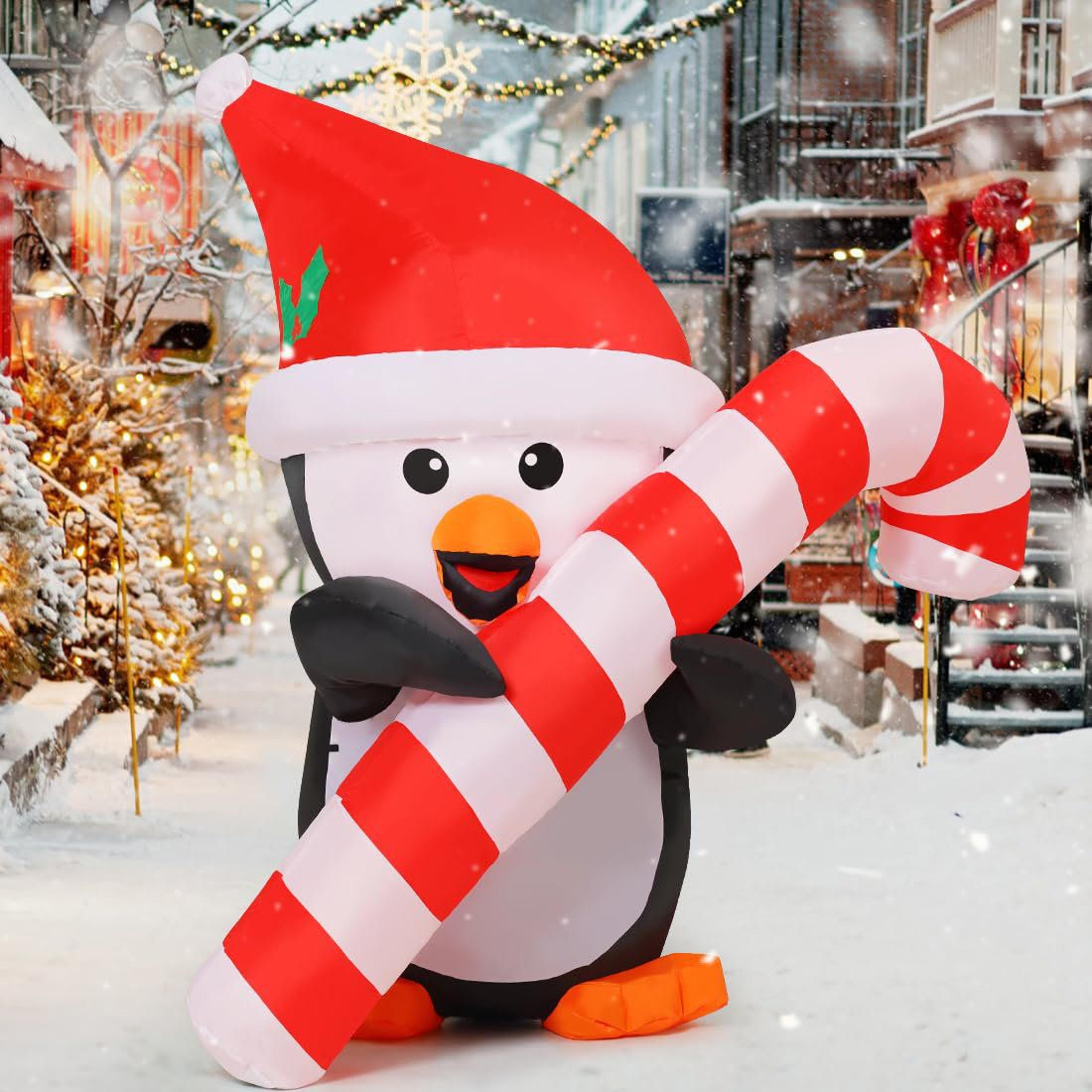 5 ft christmas inflatable penguin with candy cane and led lights