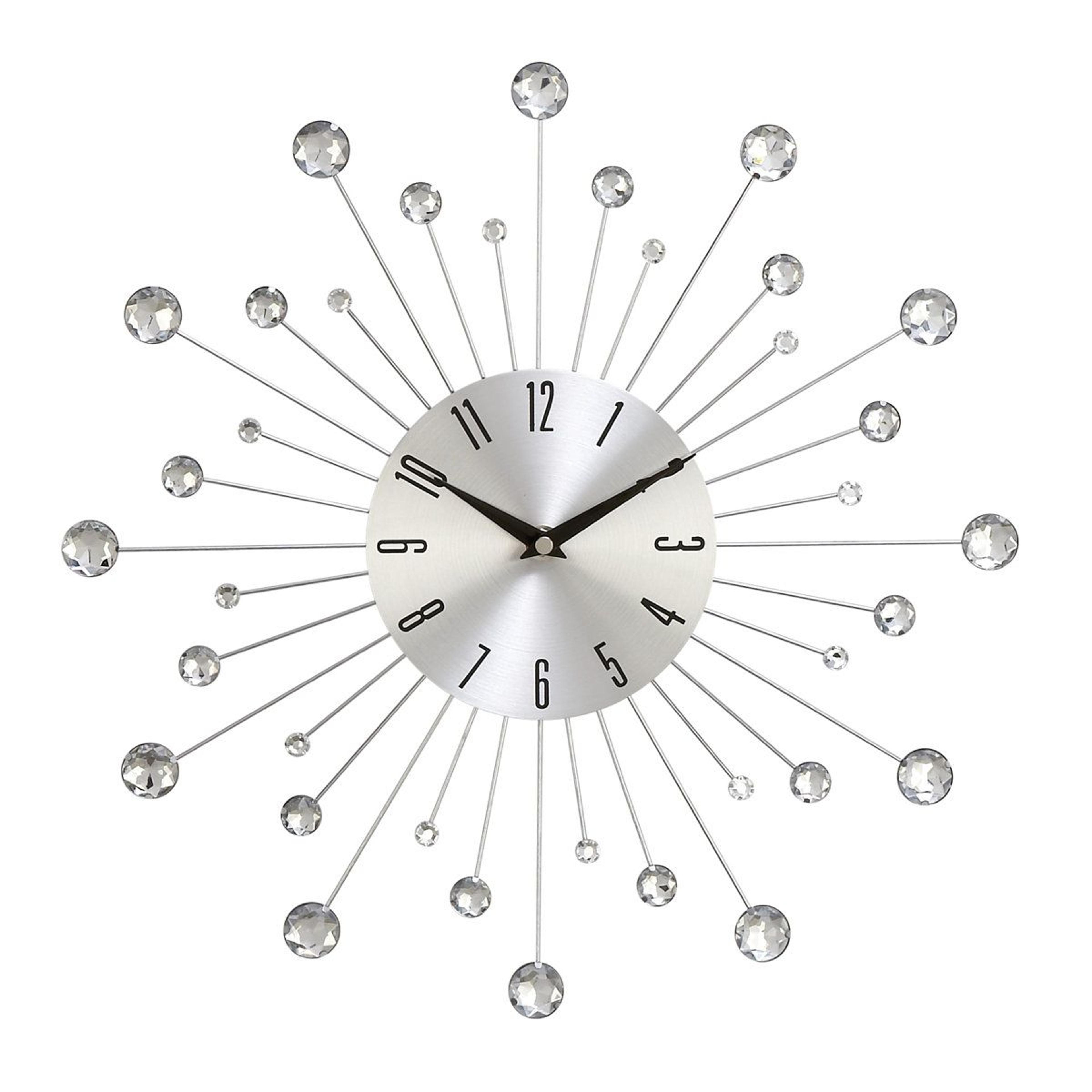 gold starburst wall clock with crystal accents and silent quartz movement