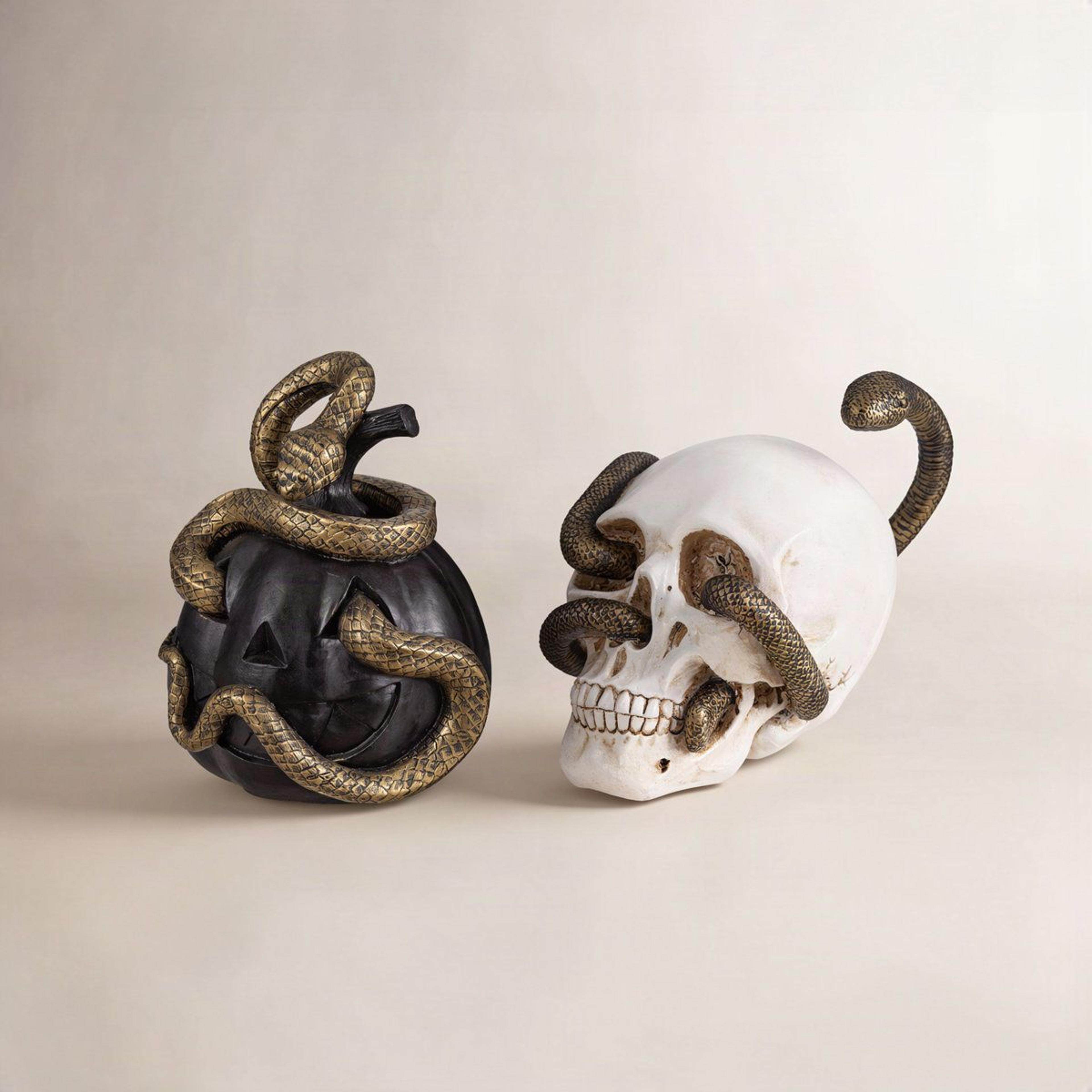 halloween pumpkin and skull table decor with snake accents 7 inch polyresin statues set of 2