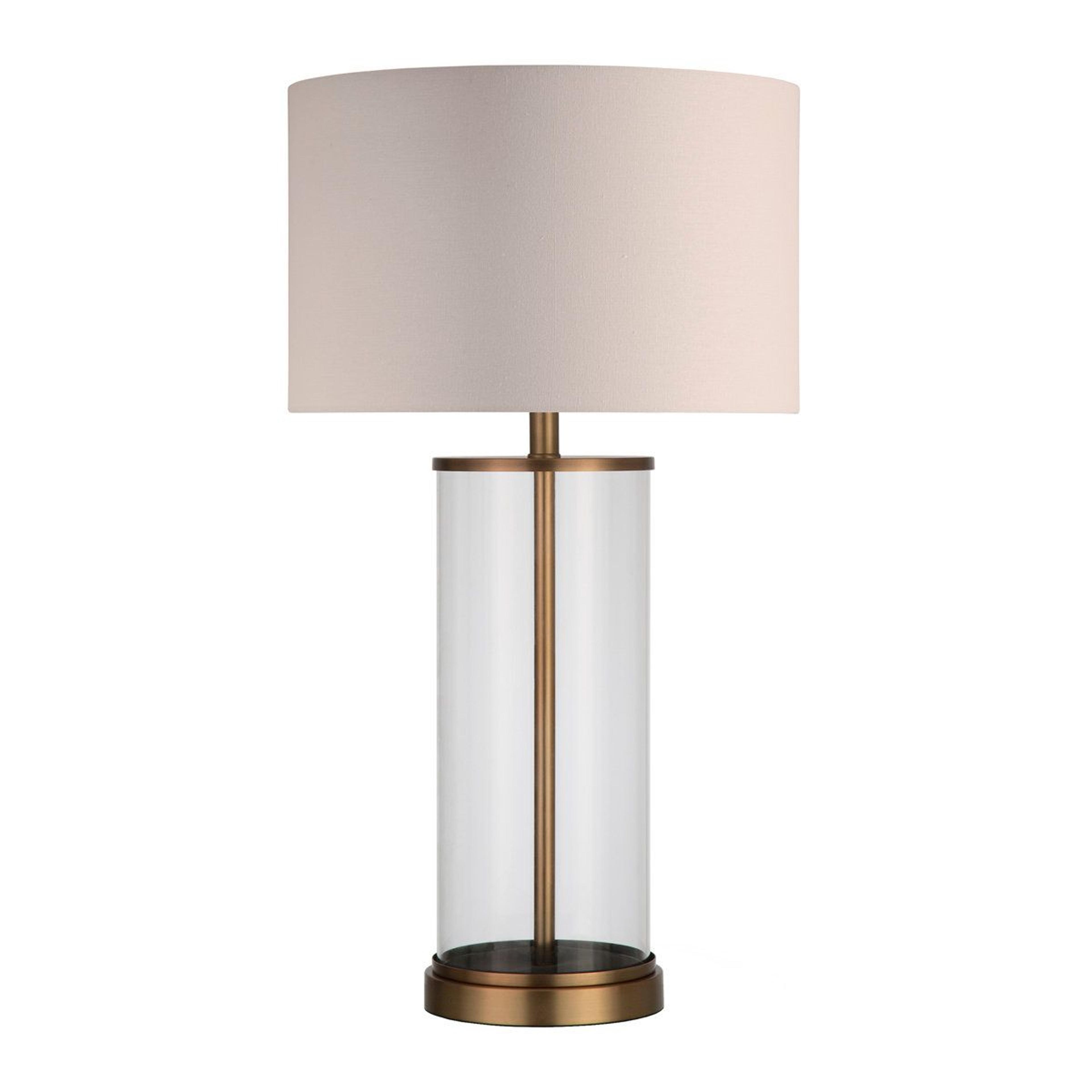 clear glass table lamp with metal base and drum shade