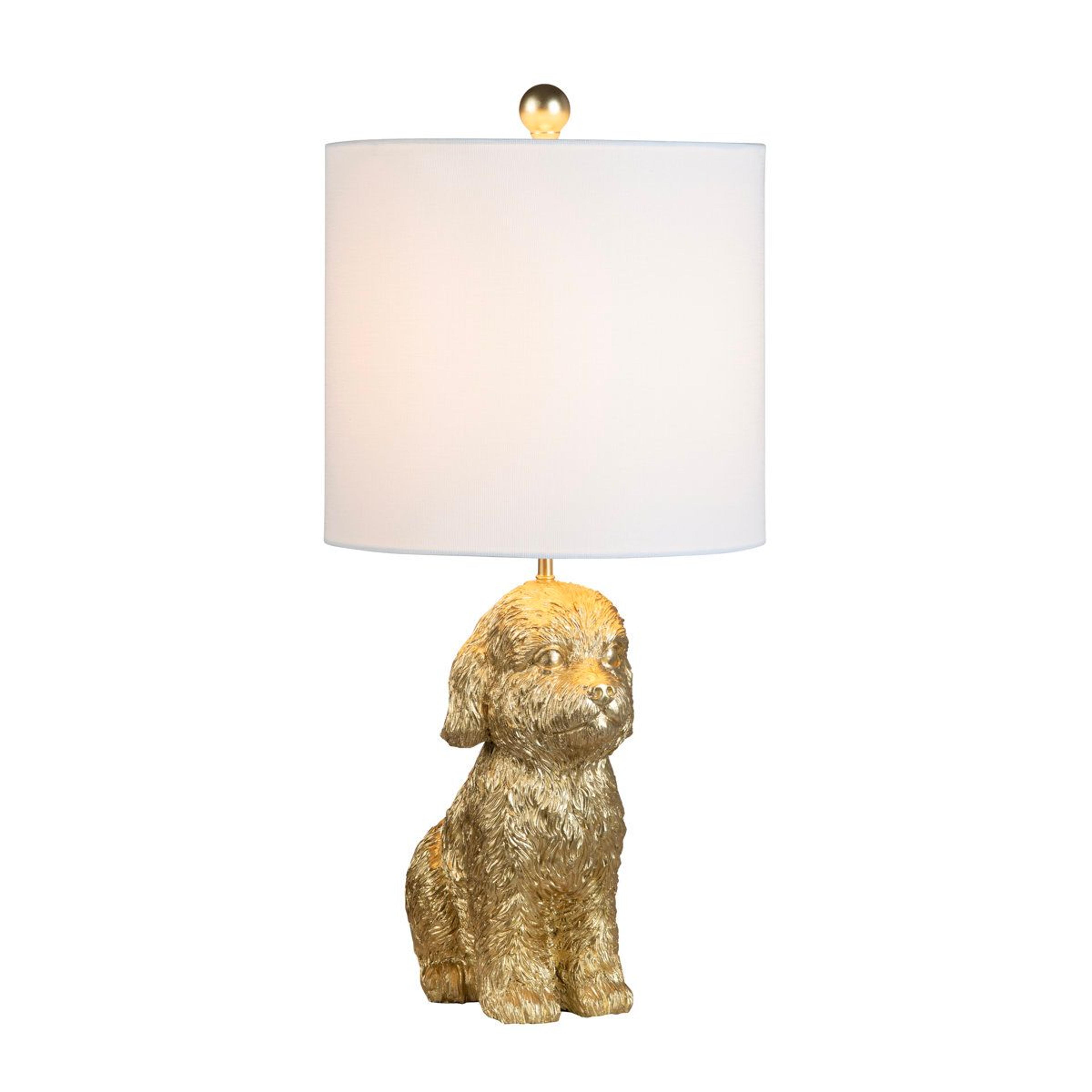 resin doodle dog table lamp with white linen shade