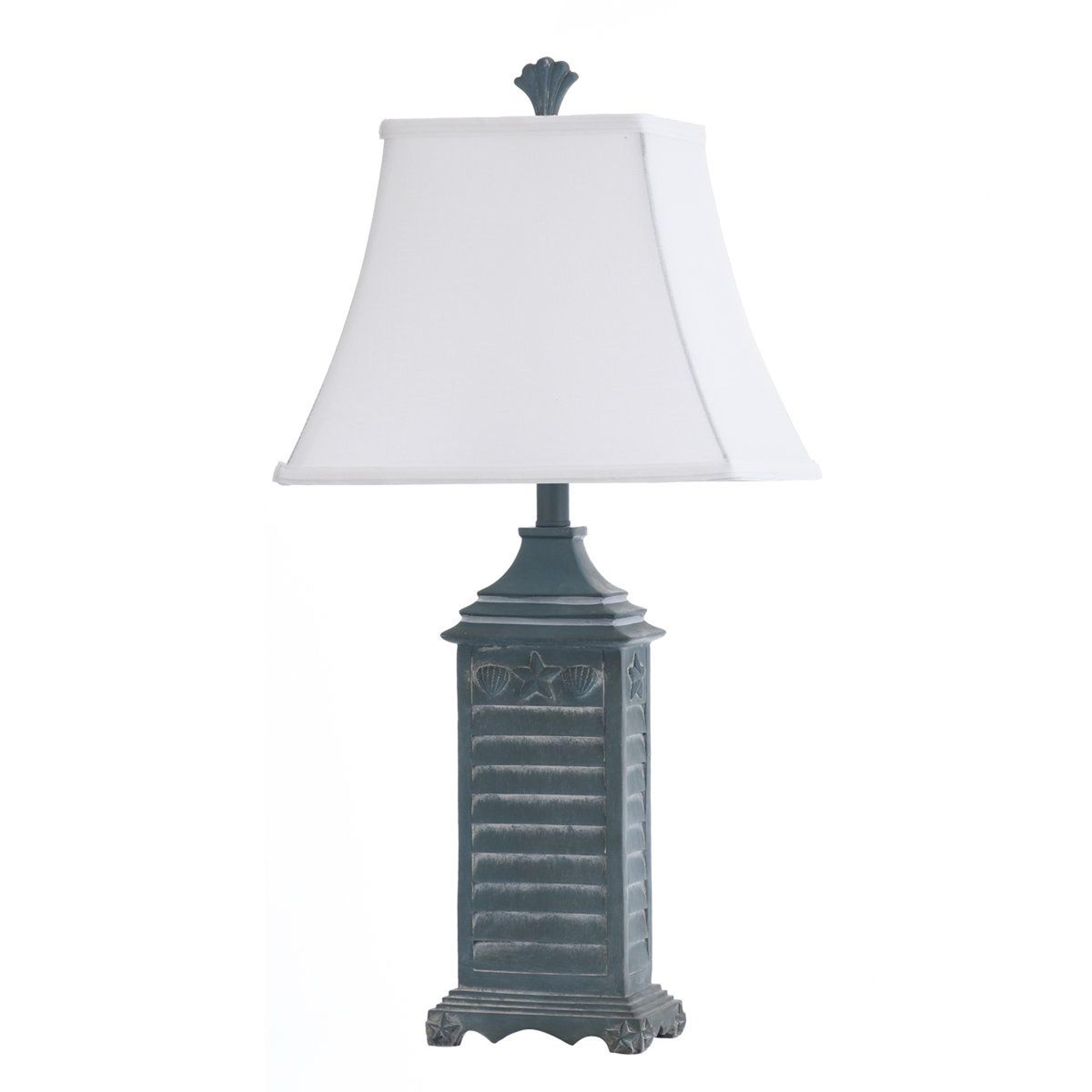29.5 inch coastal shutter table lamp with sculpted seashell accent and white bell shade