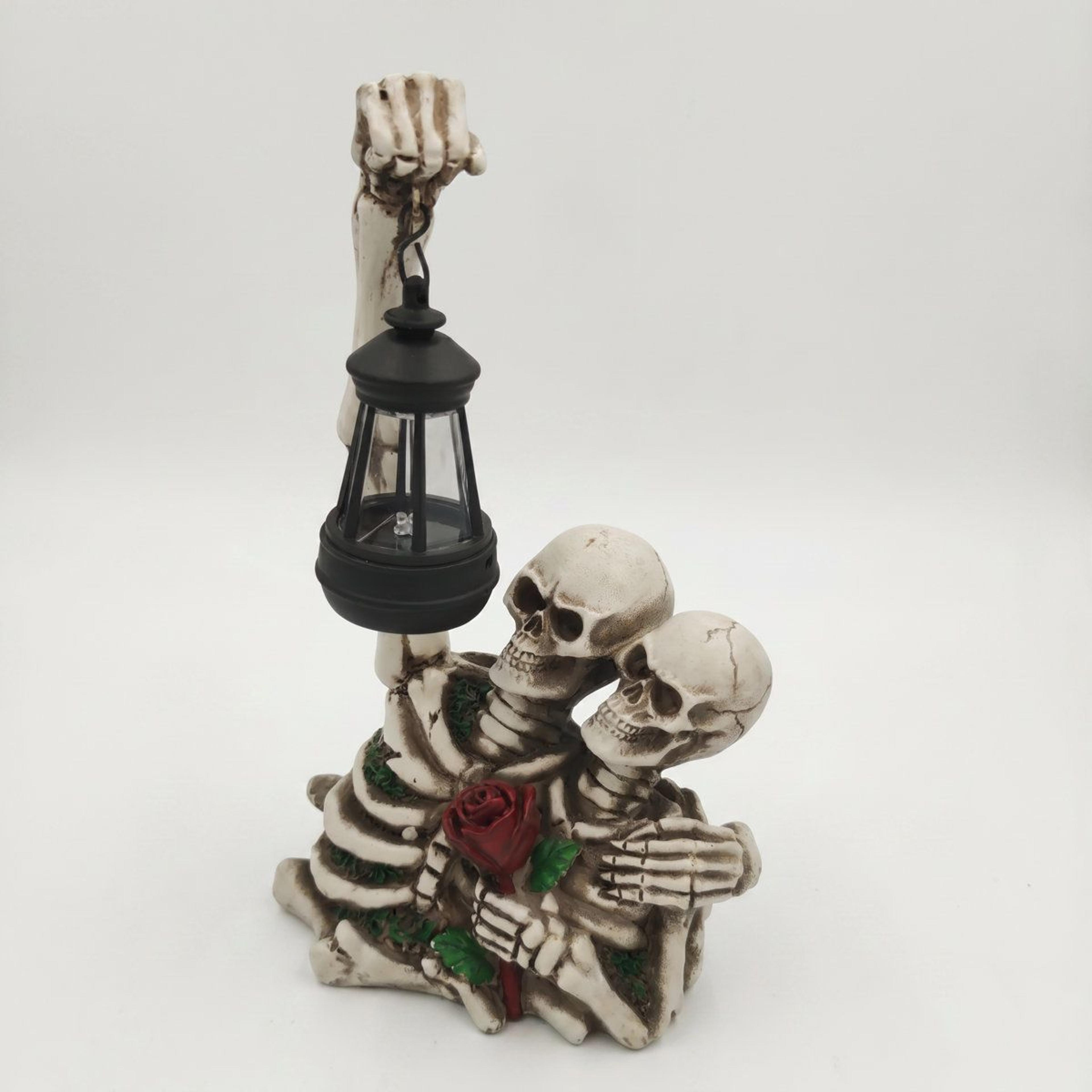 gothic skeleton couple statue with solar lantern and red rose halloween decor