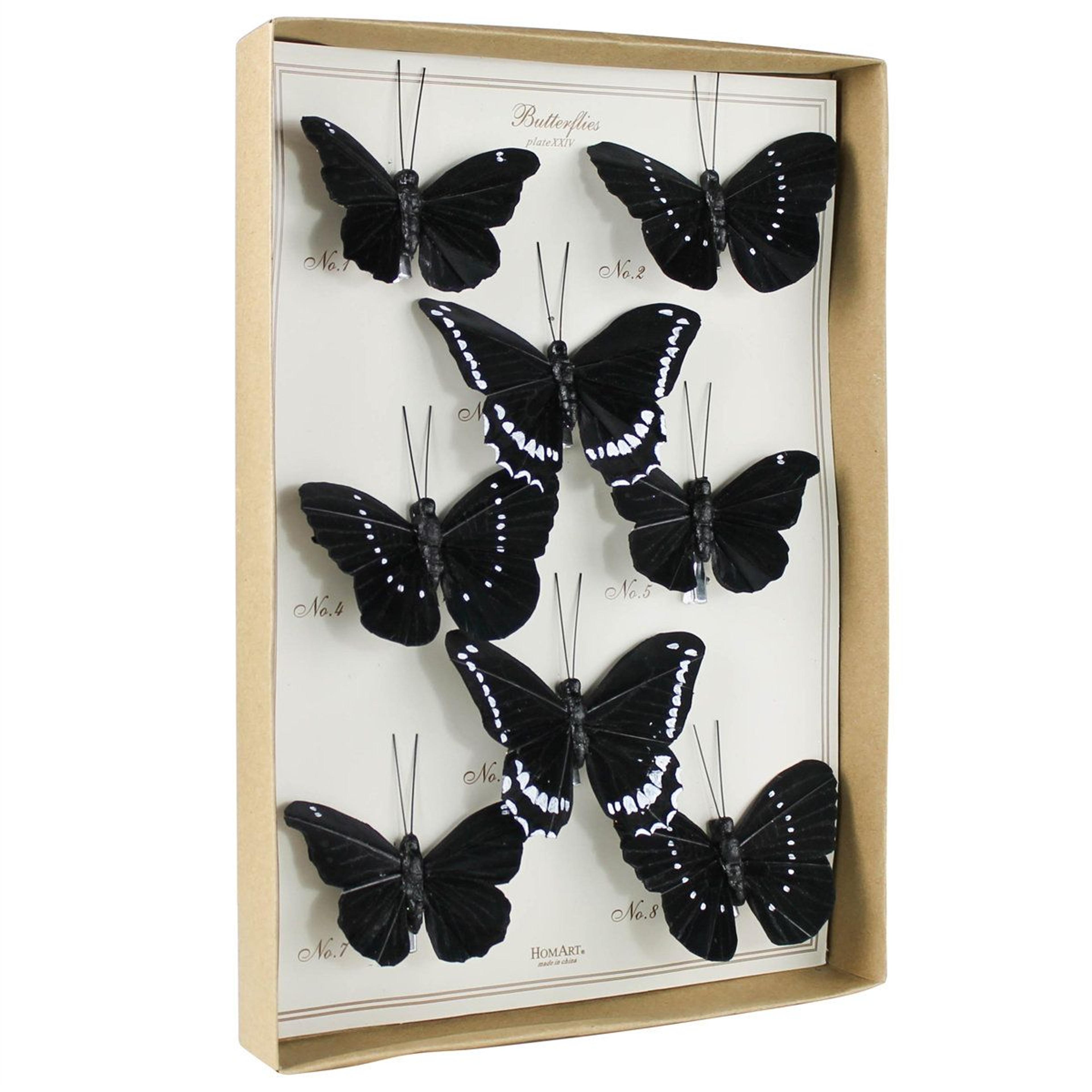 hand-painted wooden butterfly decorative object in black and natural