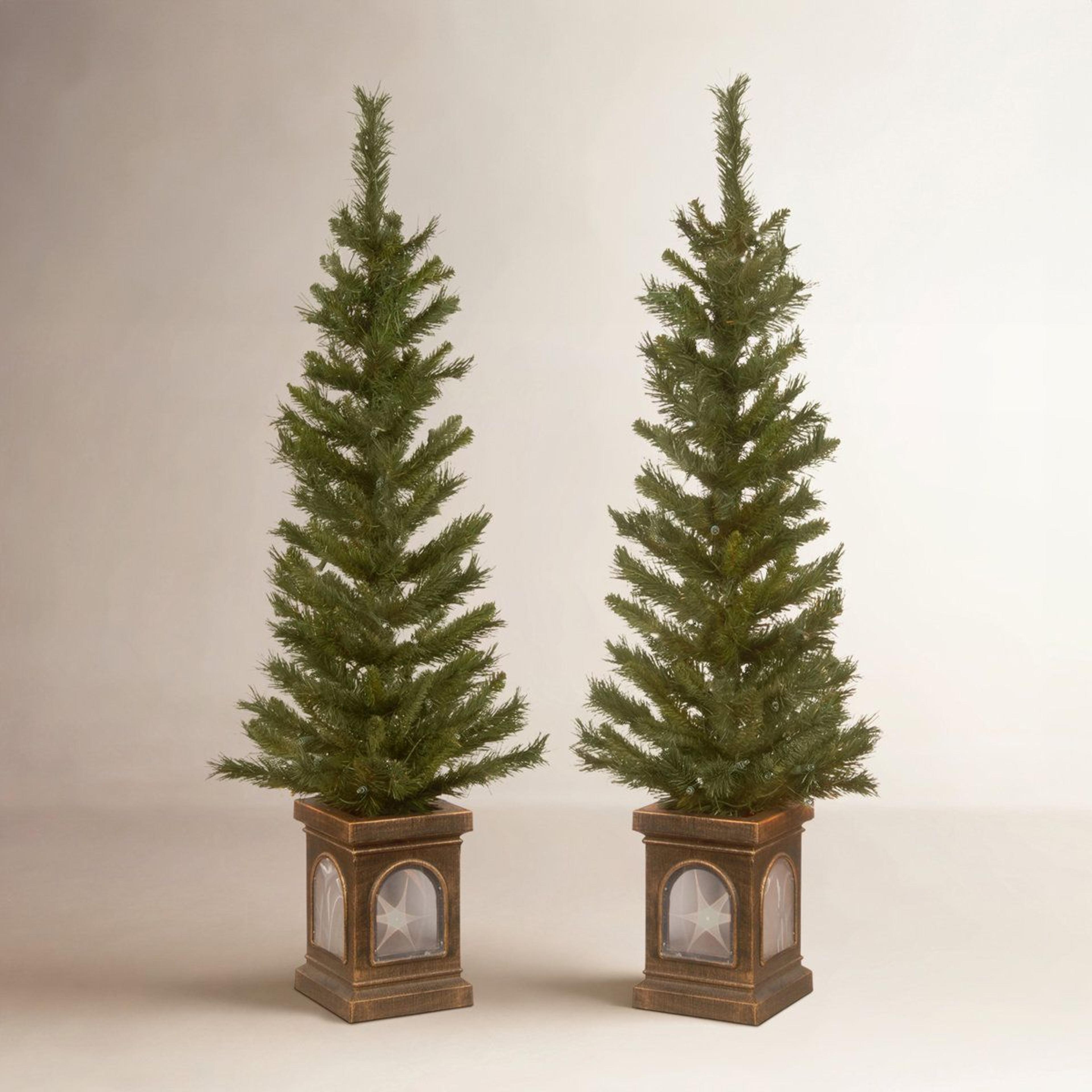 48-inch pre-lit artificial pine entrance tree with 50 clear lights and decorative urn