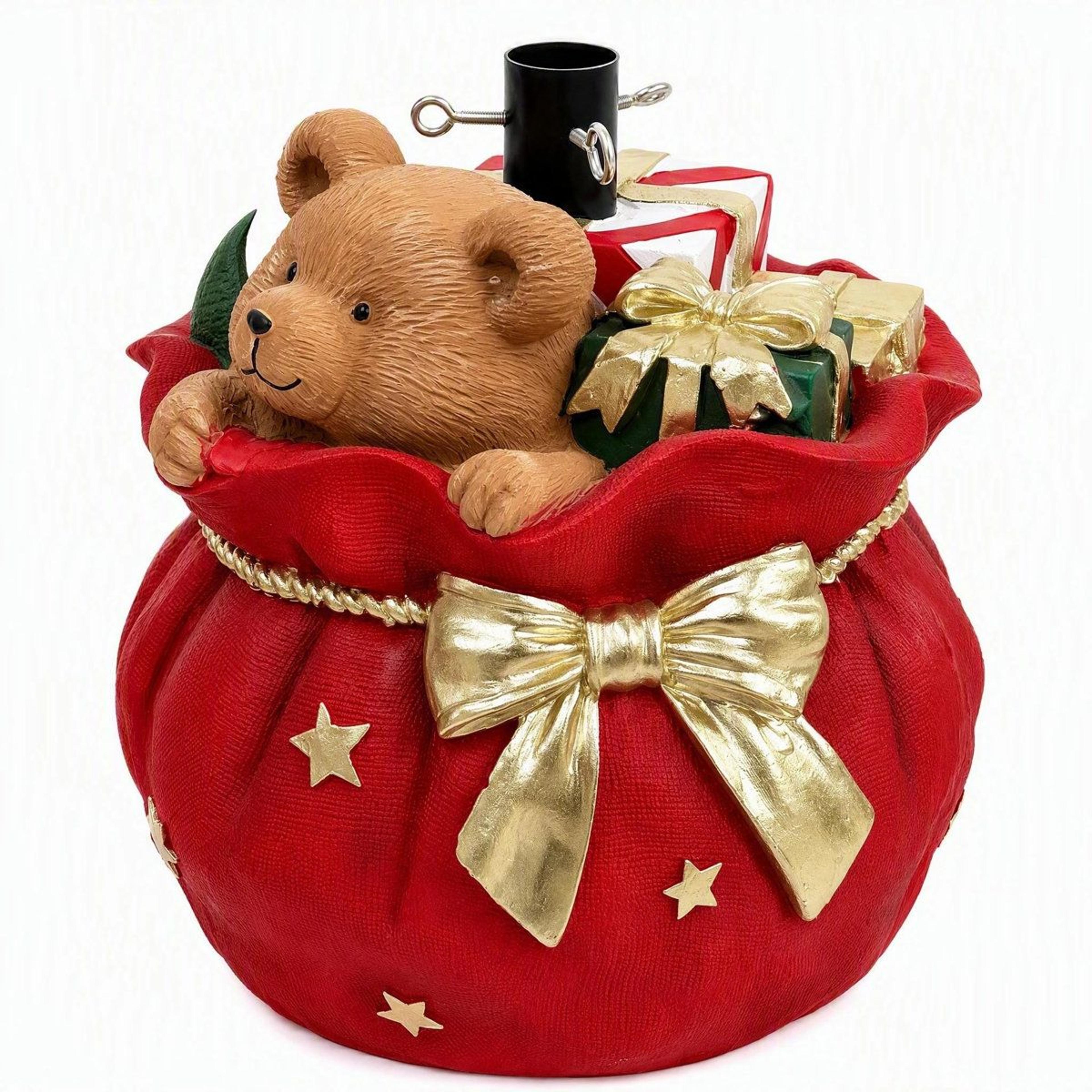 christmas tree stand with red gift sack teddy bear and gold bow design