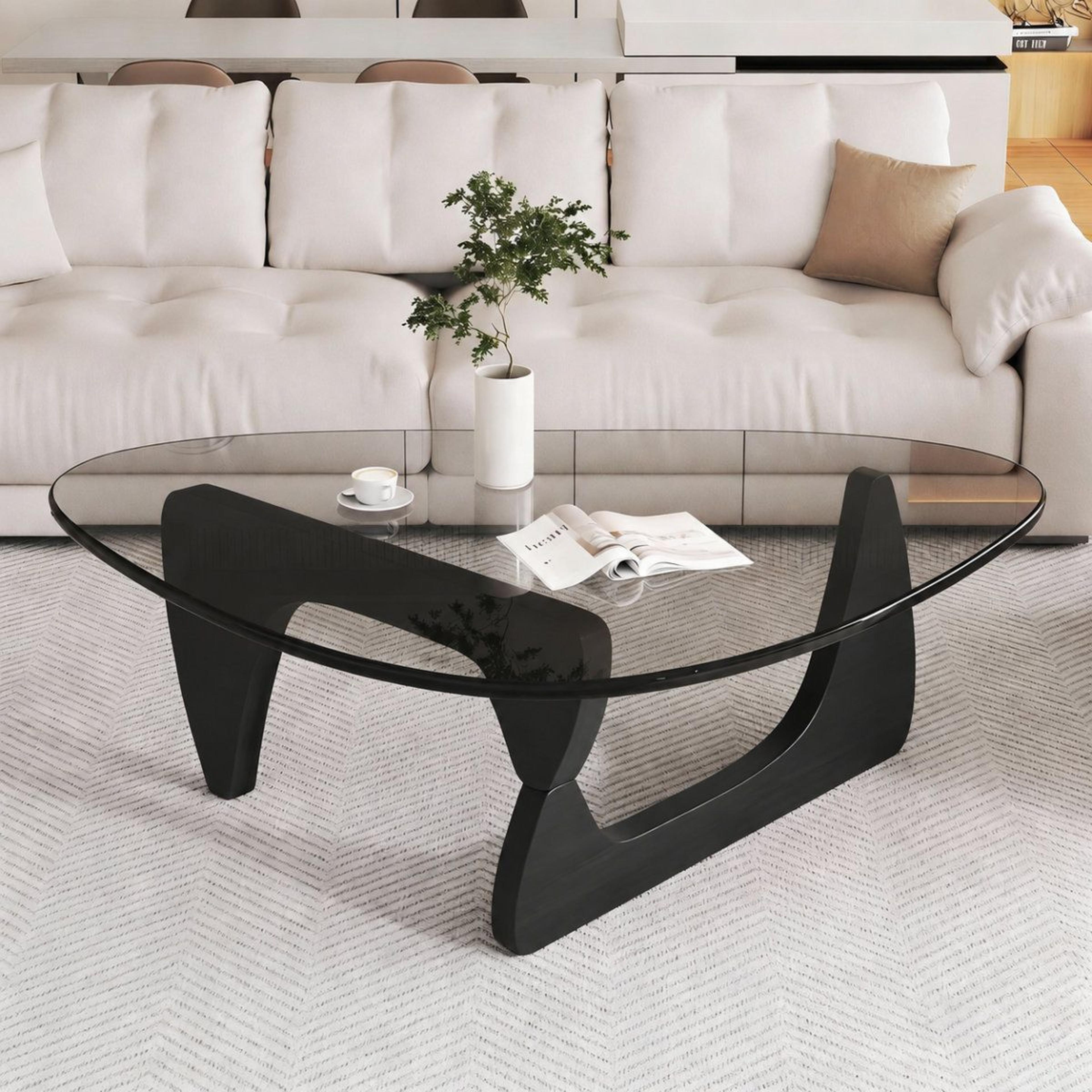 modern black coffee table with triangular mdf top and trestle base