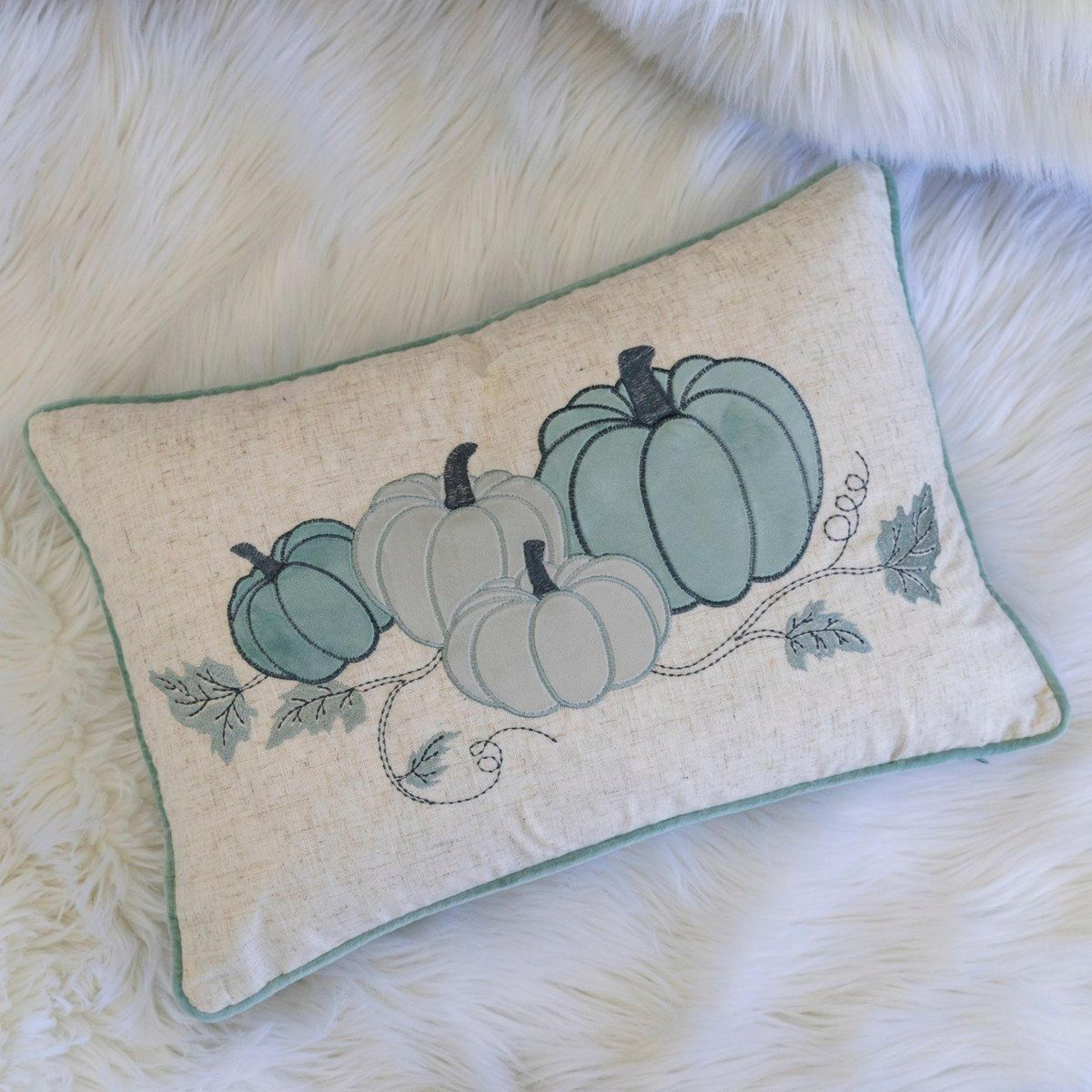 embroidered pumpkin lumbar throw pillow – light blue fall accent cushion