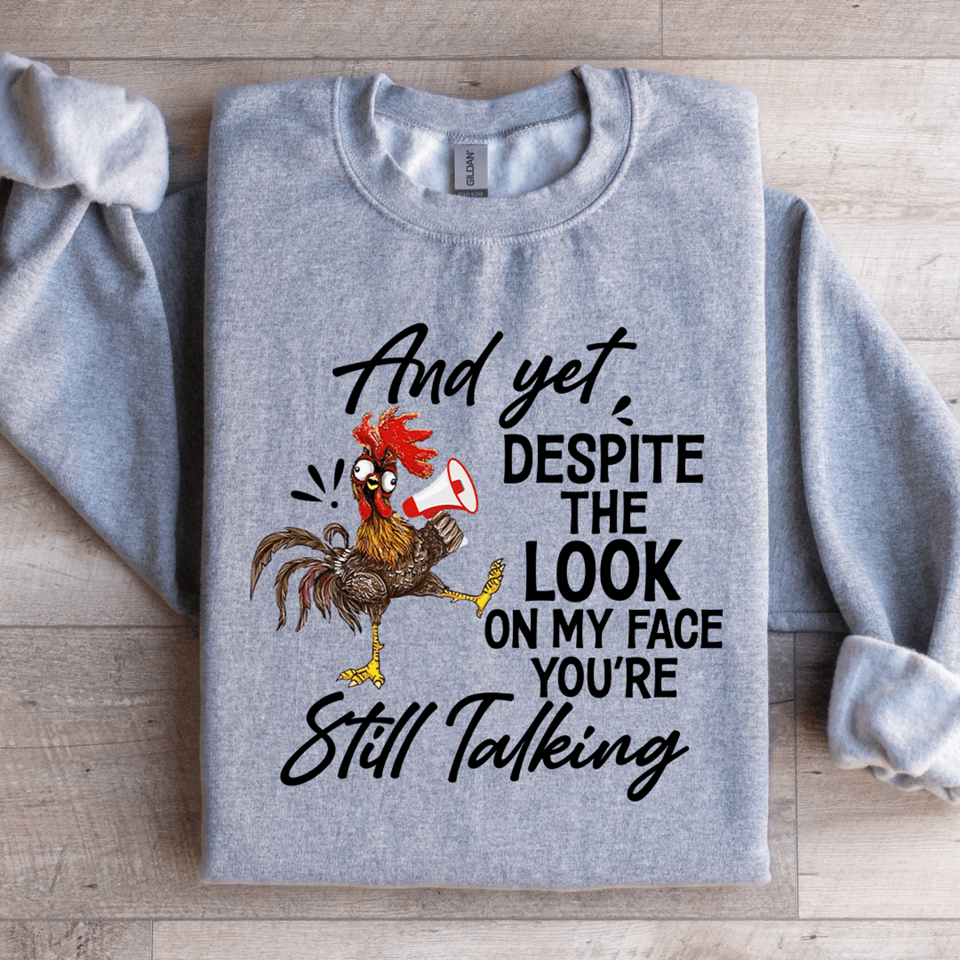 and yet despite the look on my face sweatshirt