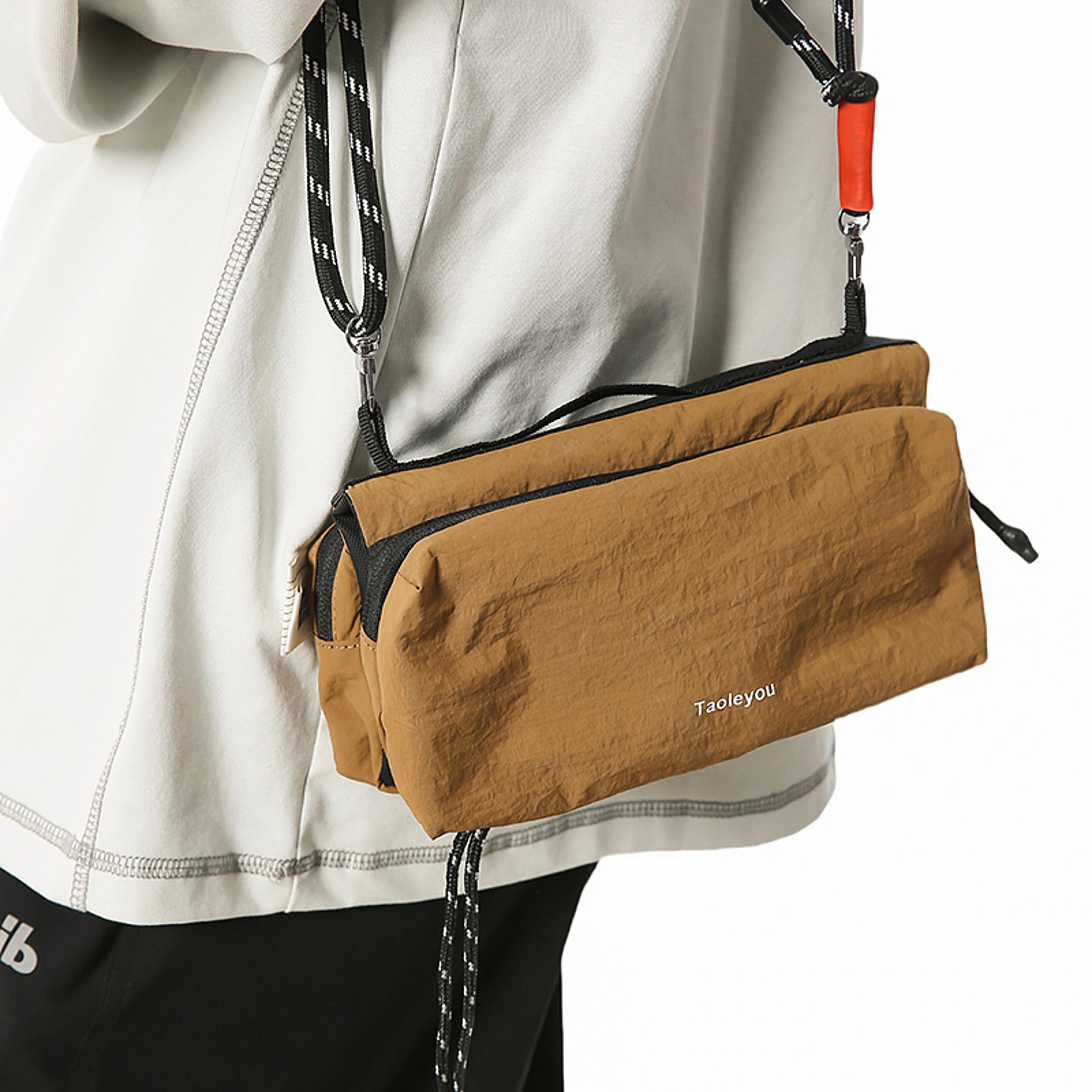 unisex outdoor mountaineering cross body bag durable versatile and spacious