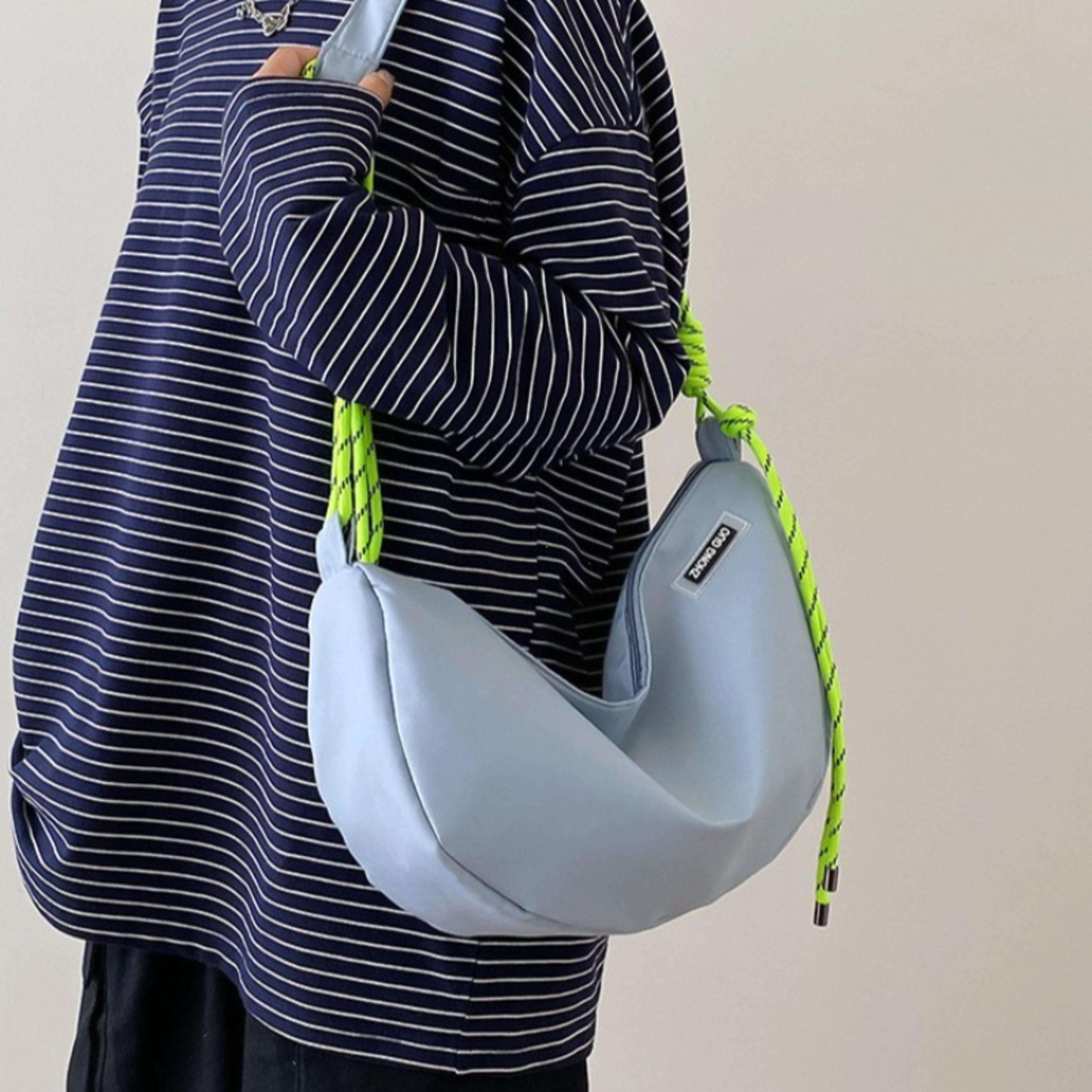 nylon hobo shoulder bag with zipper closure and interior pockets