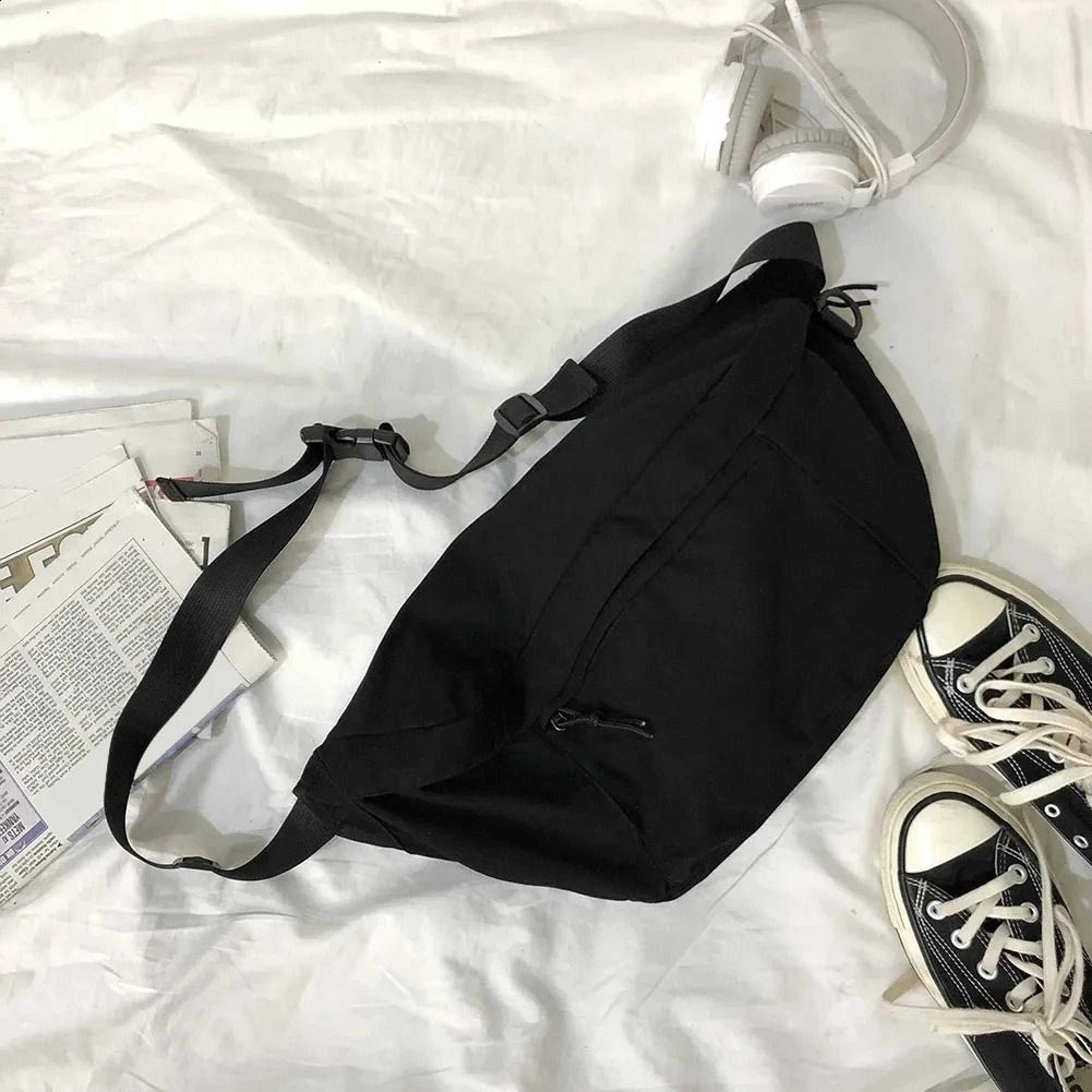 large capacity fanny pack with adjustable strap and multiple compartments