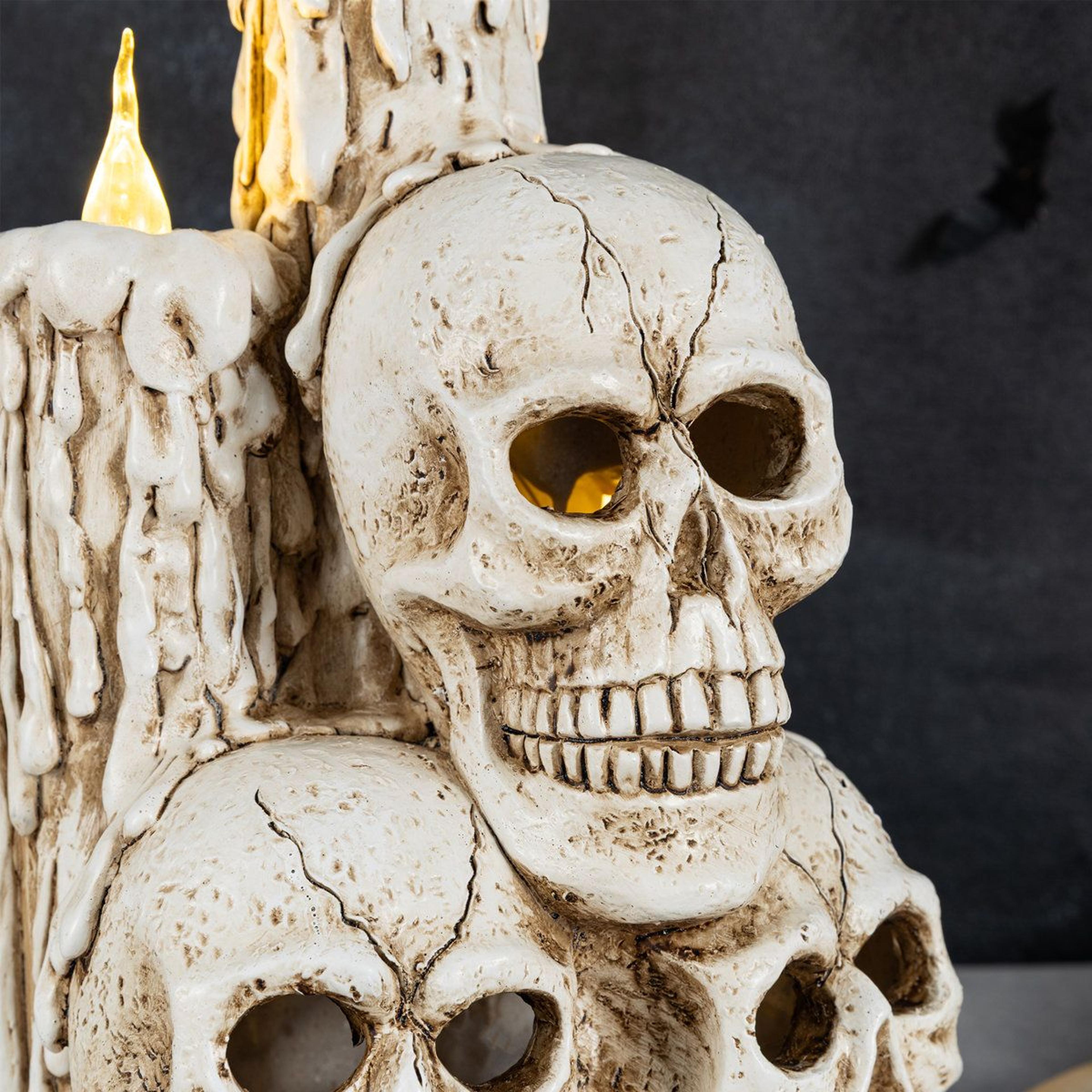 lighted halloween skull and candle table decor with timer