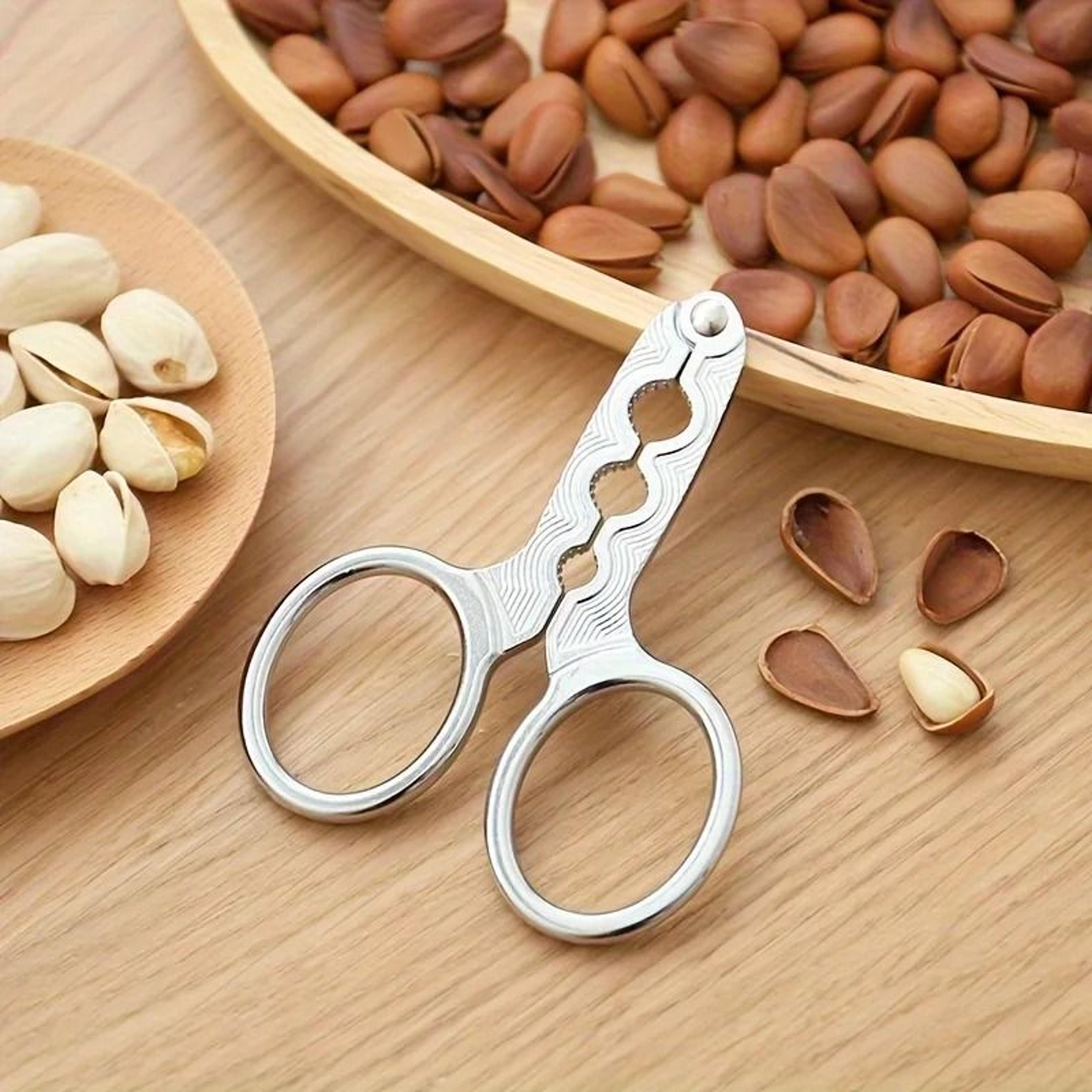premium stainless steel nut cracker – hazelnut, pine nut & melon seed opener