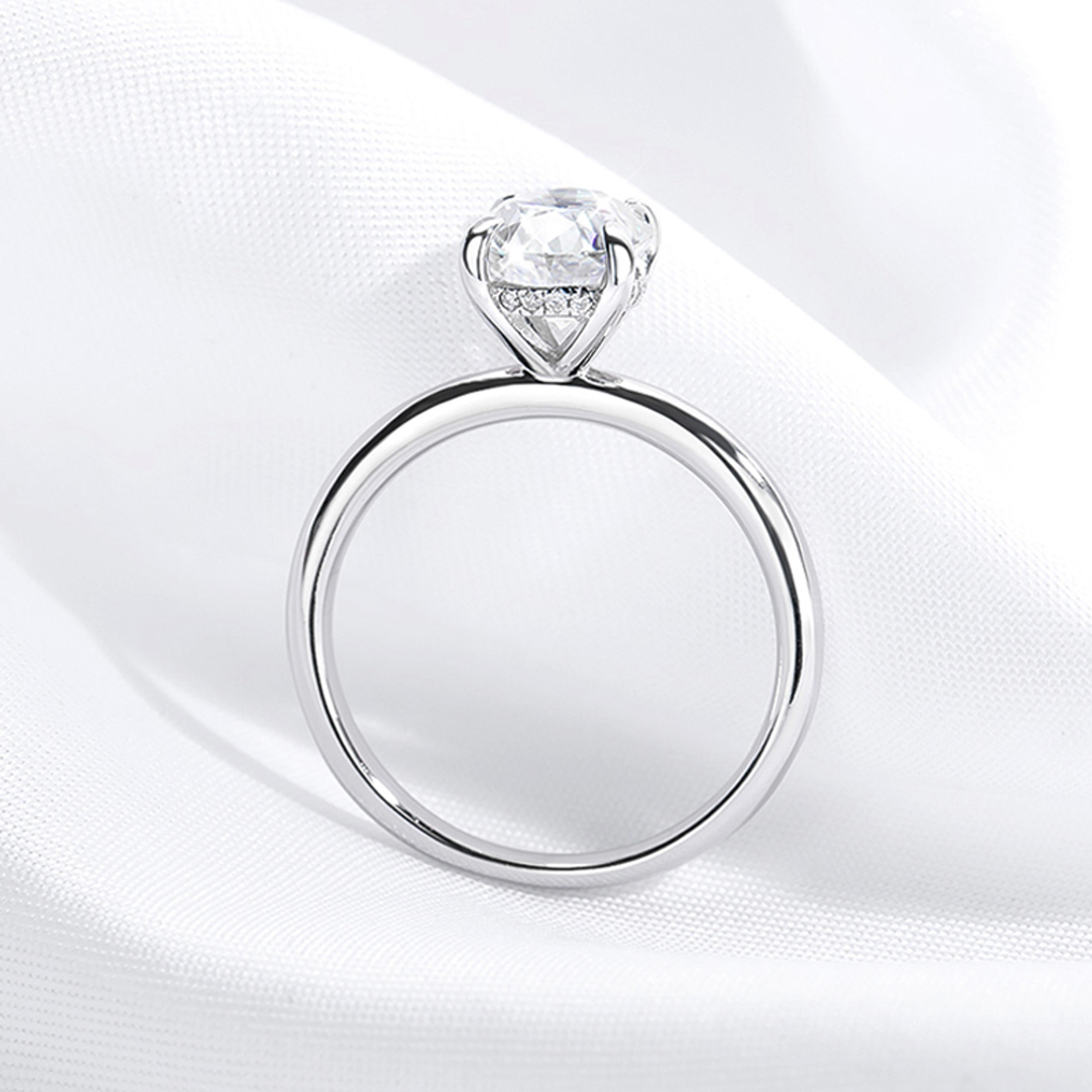 oval moissanite engagement ring set in 18k gold plated 925 sterling silver