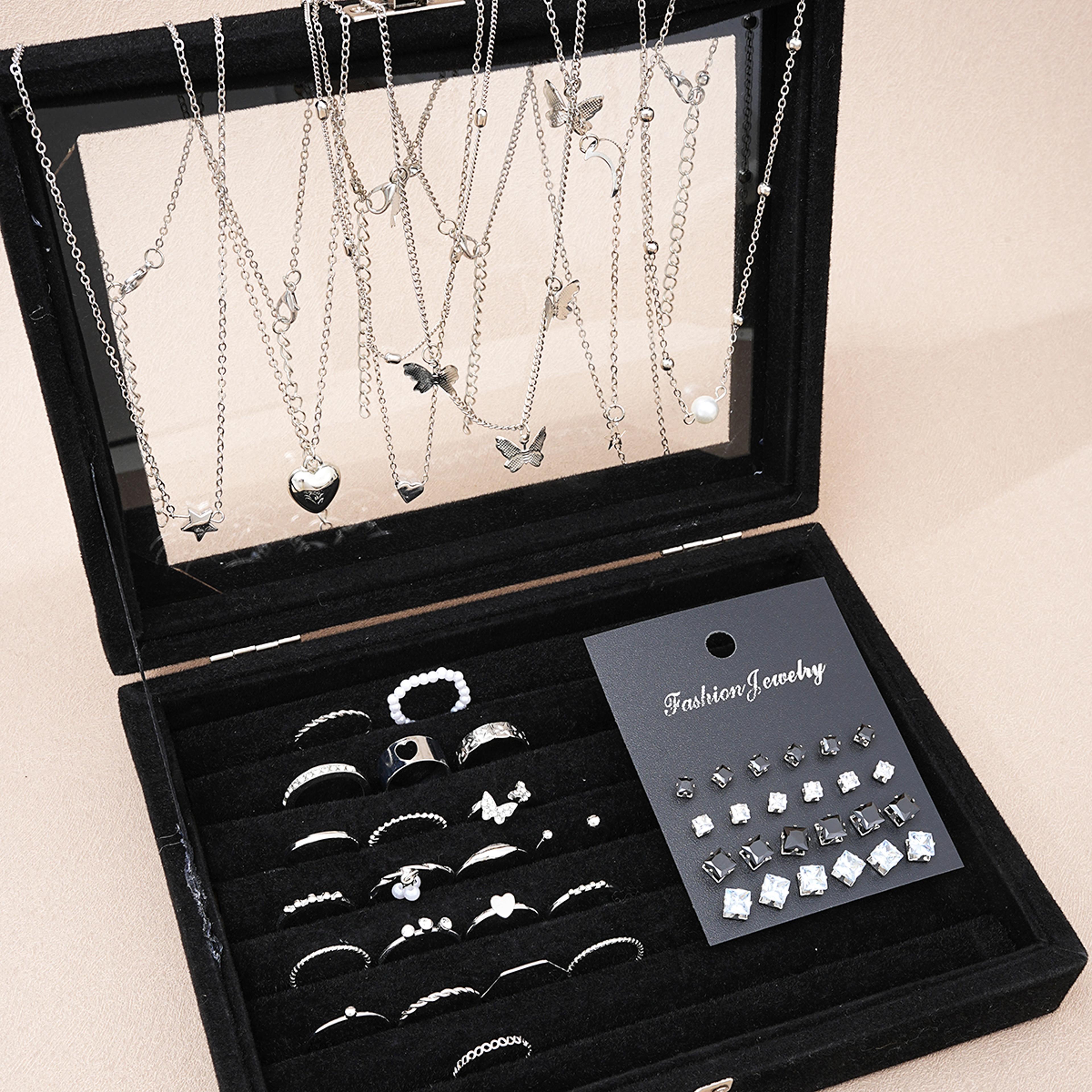 51 piece silver tone jewelry set with necklaces earrings and rings