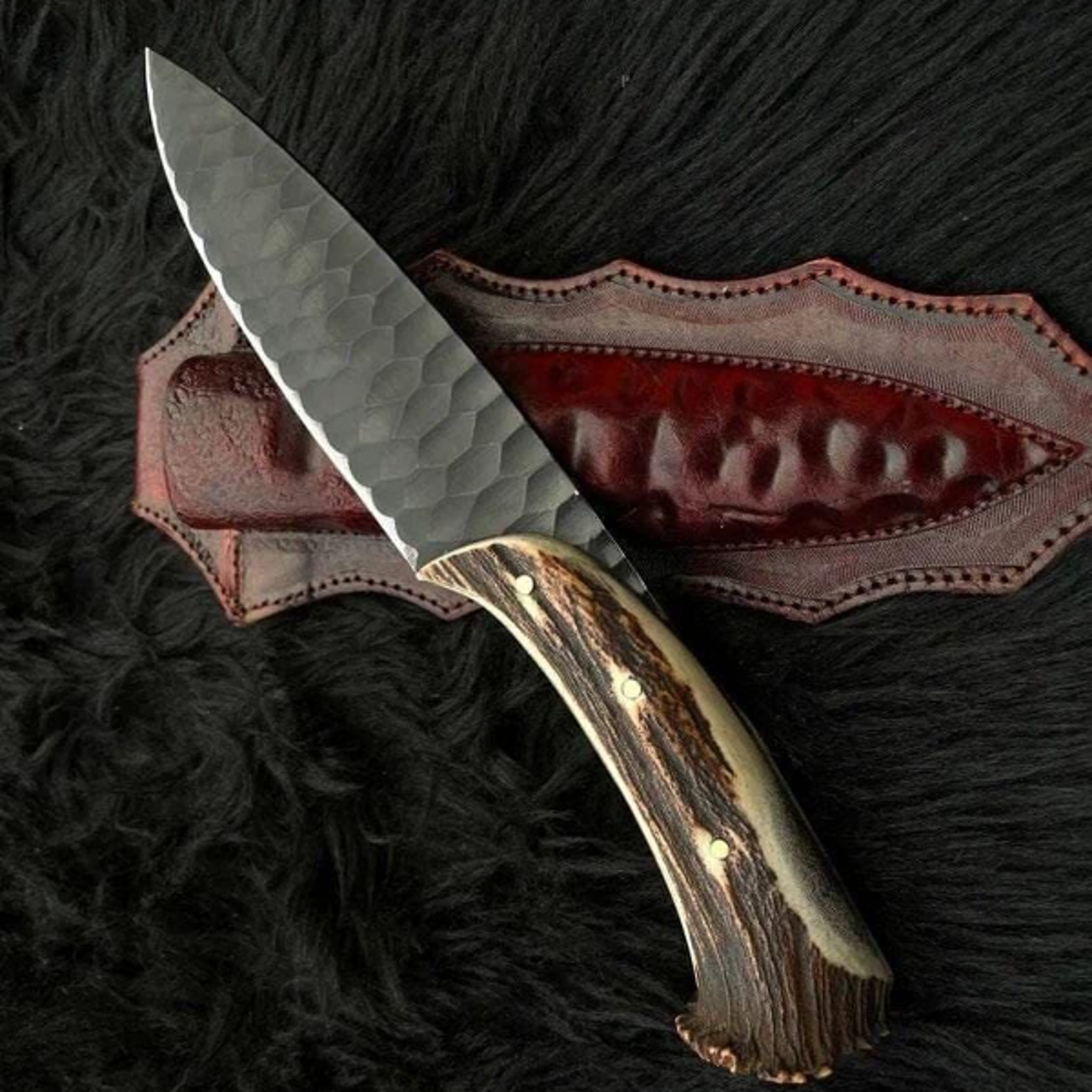 custom handmade forged 1095 powder coated steel hunting knife with antler handle and leather sheath