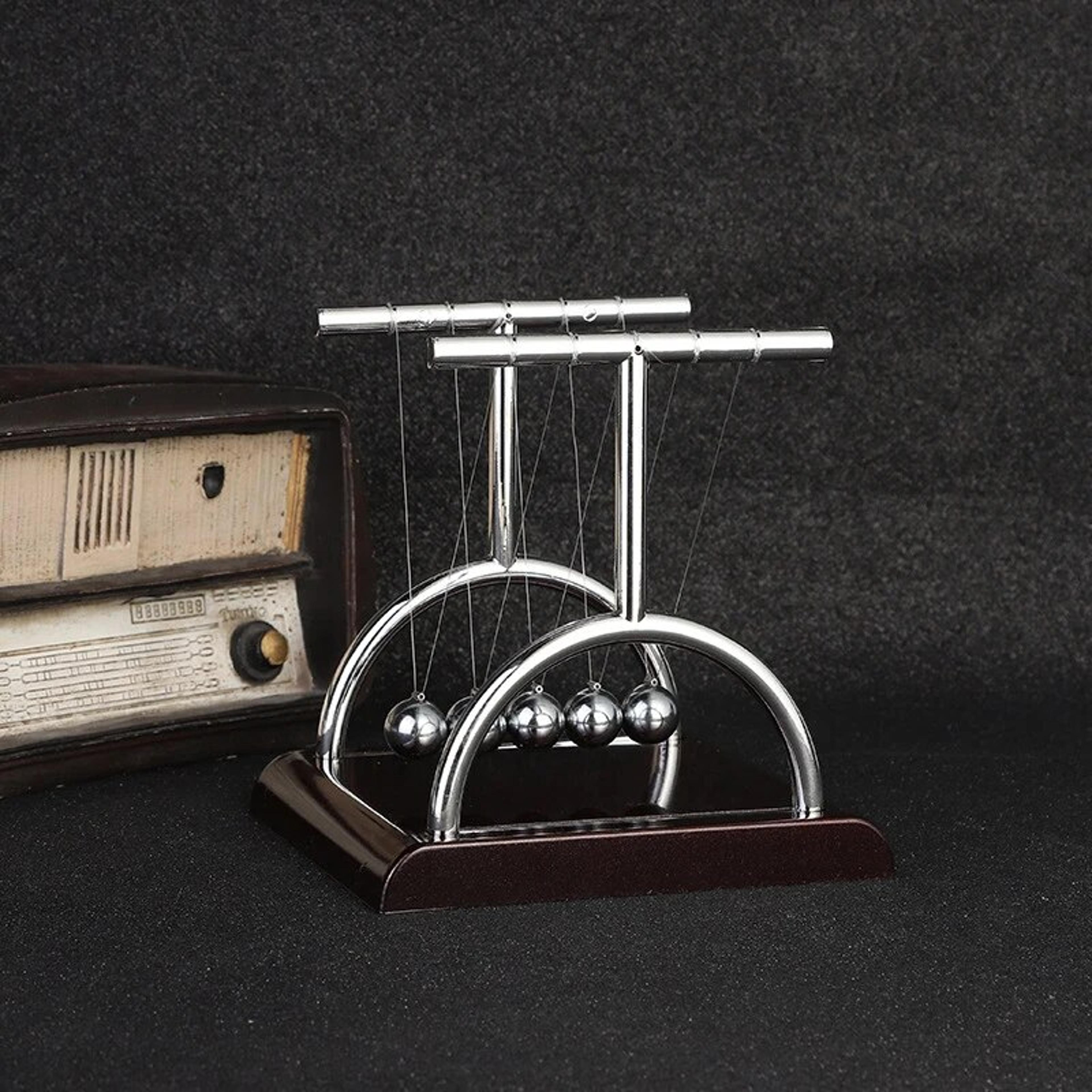 newton cradle physics desk toy steel ball pendulum