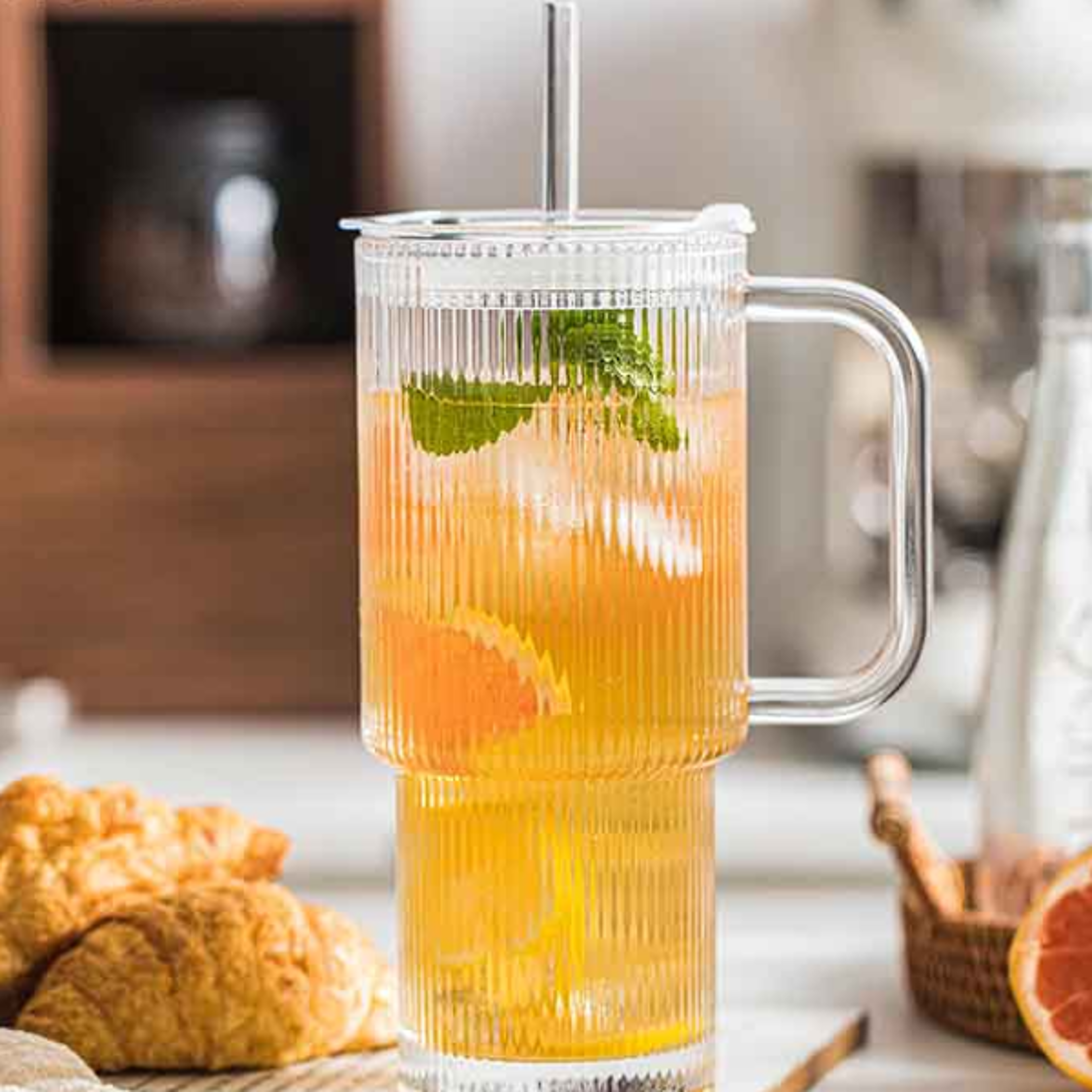 large ribbed glass tumbler with handle and lid, iced coffee cup with straw, modern glass mug