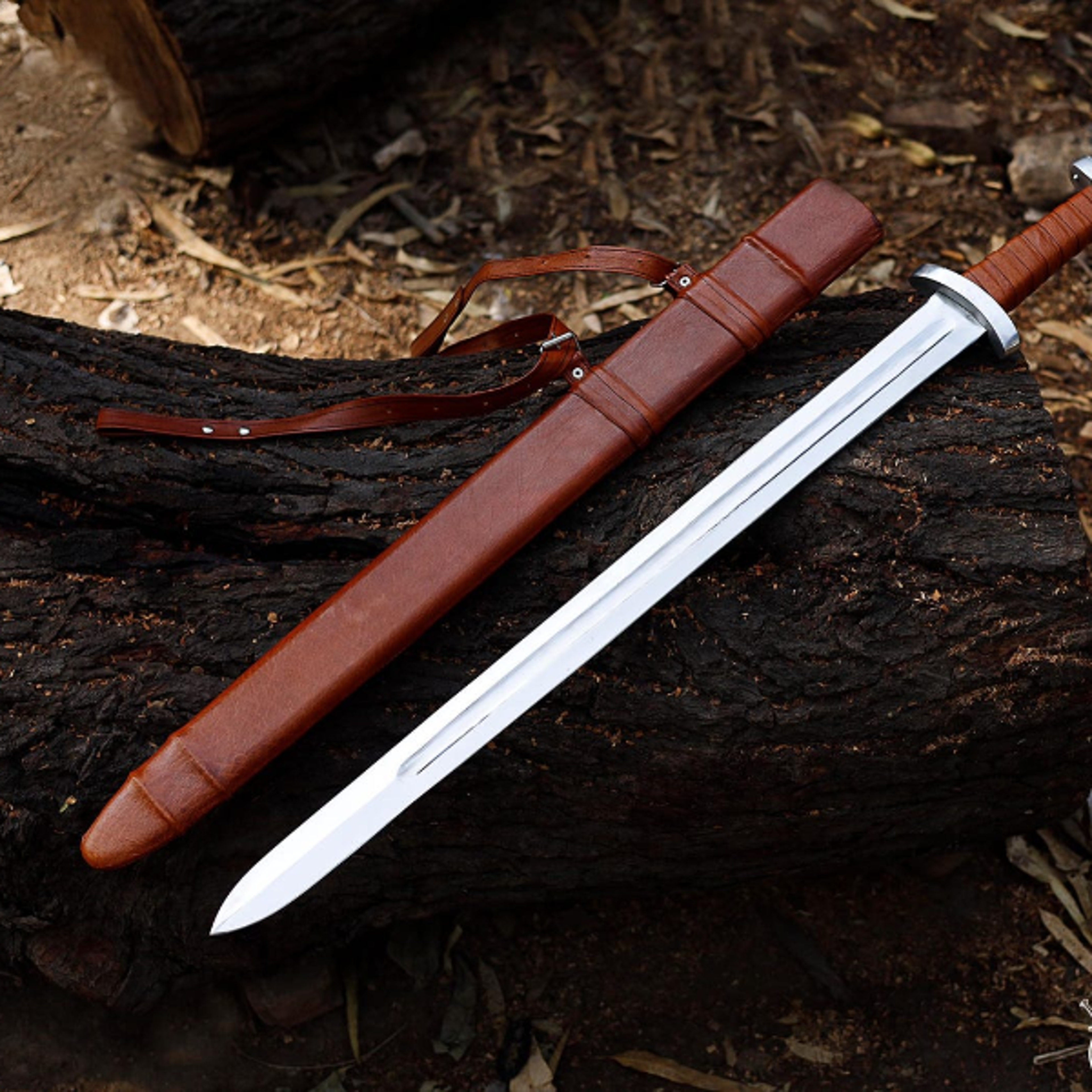 handcrafted carolingian viking sword with polished steel blade and leather grip for decorative display