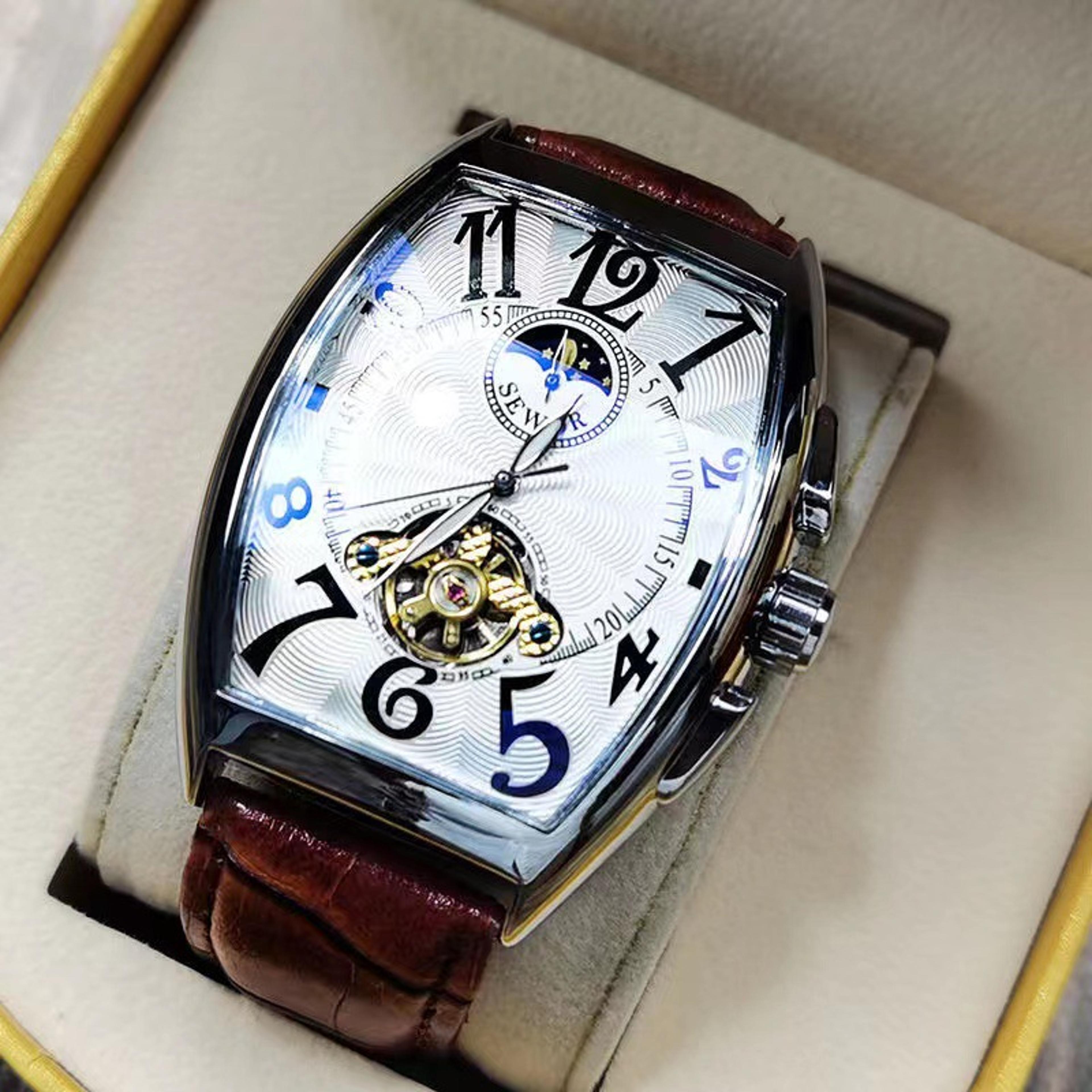 men's automatic mechanical skeleton watch with tonneau case and leather band