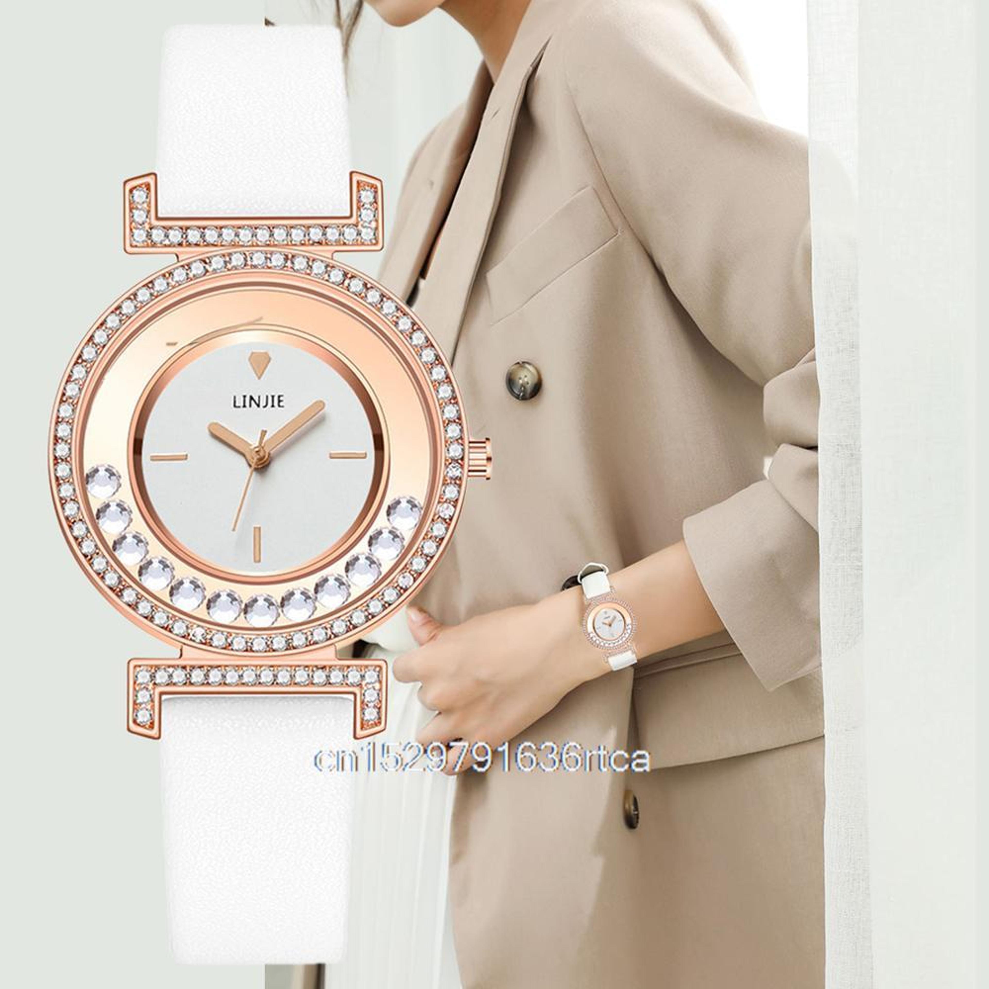 women's minimalist quartz watch with diamond-style dial and leather strap