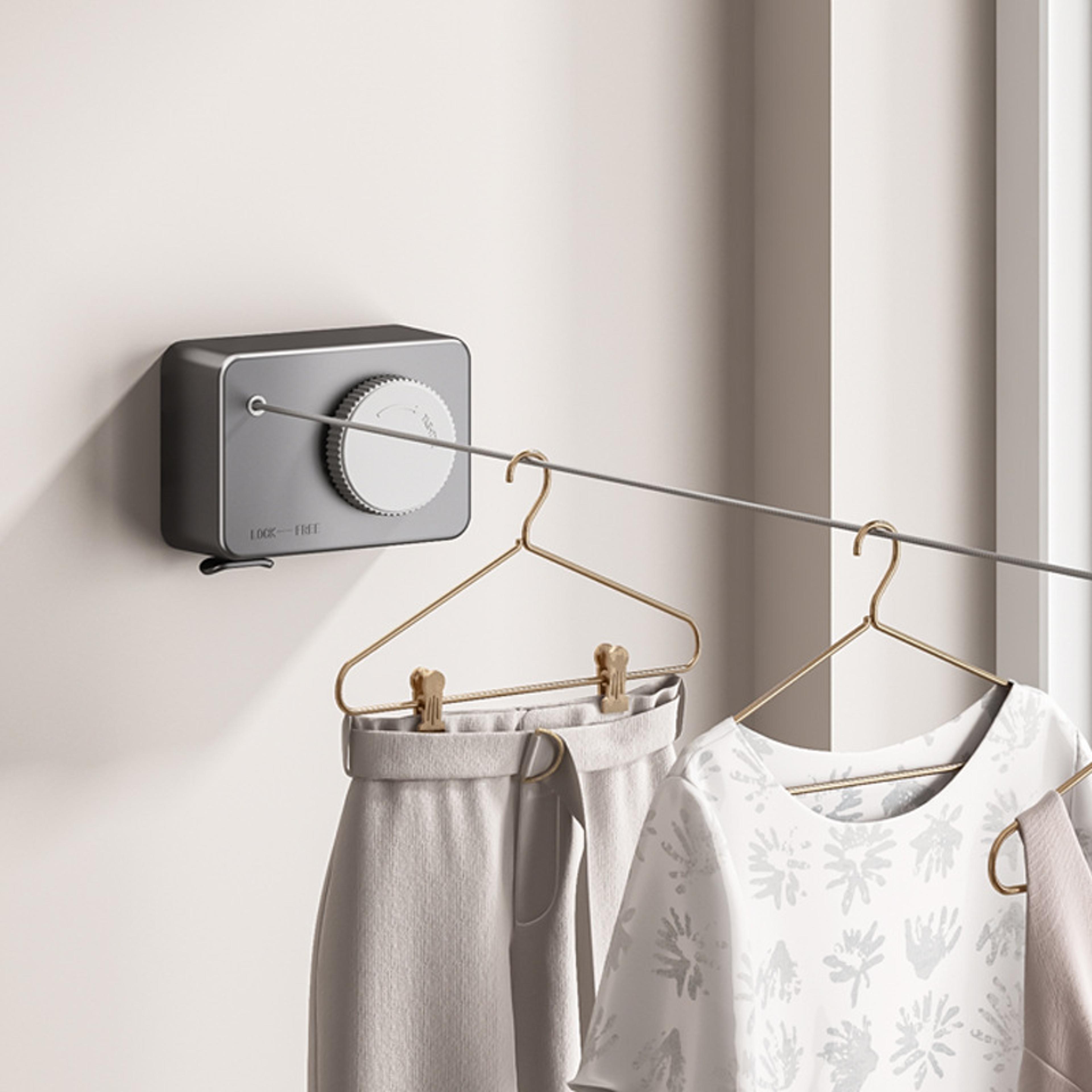 retractable stainless steel clothesline for space-saving, pull-out drying rack