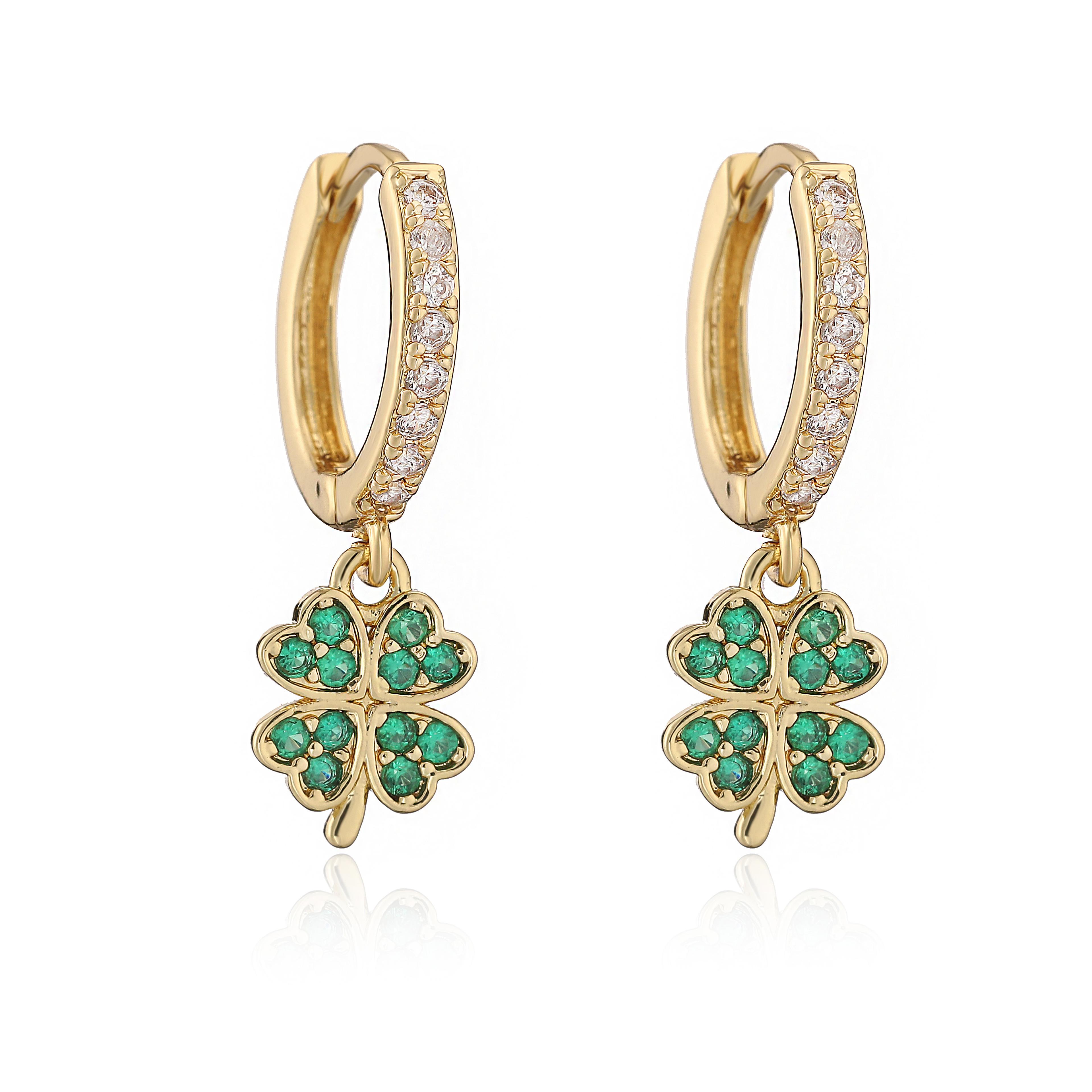 gold plated celestial earrings with sun star charms and zircon