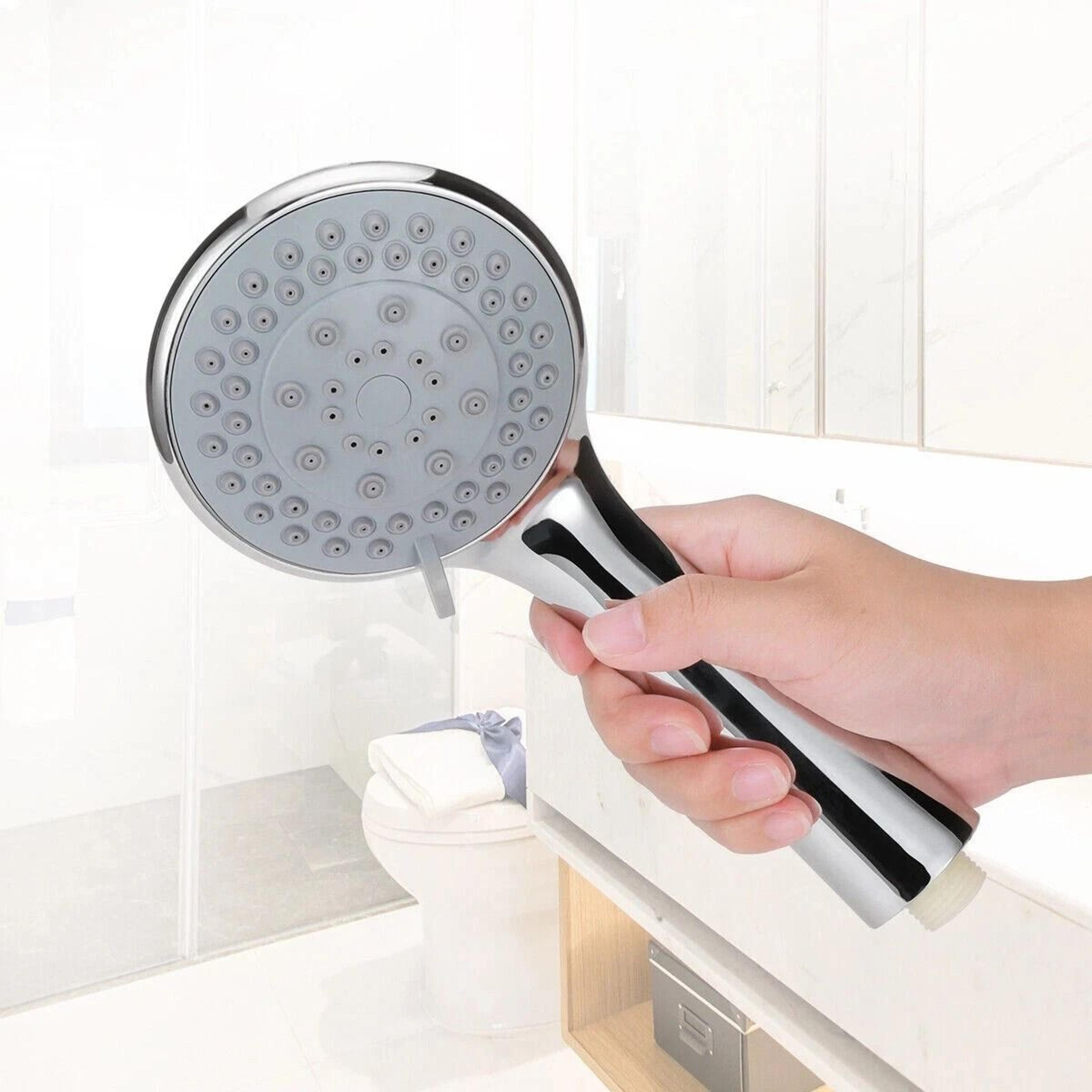 high-pressure handheld shower head with spray settings and hose