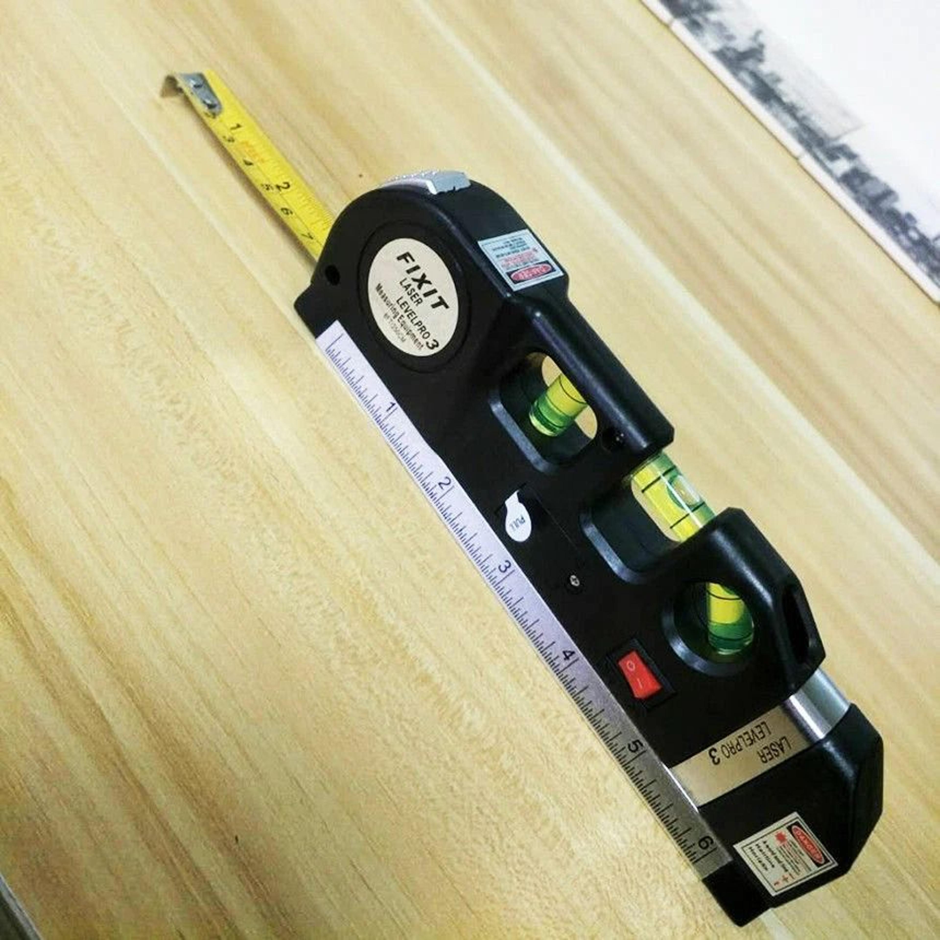 multipurpose laser level tool with measuring tape & bubble alignment system