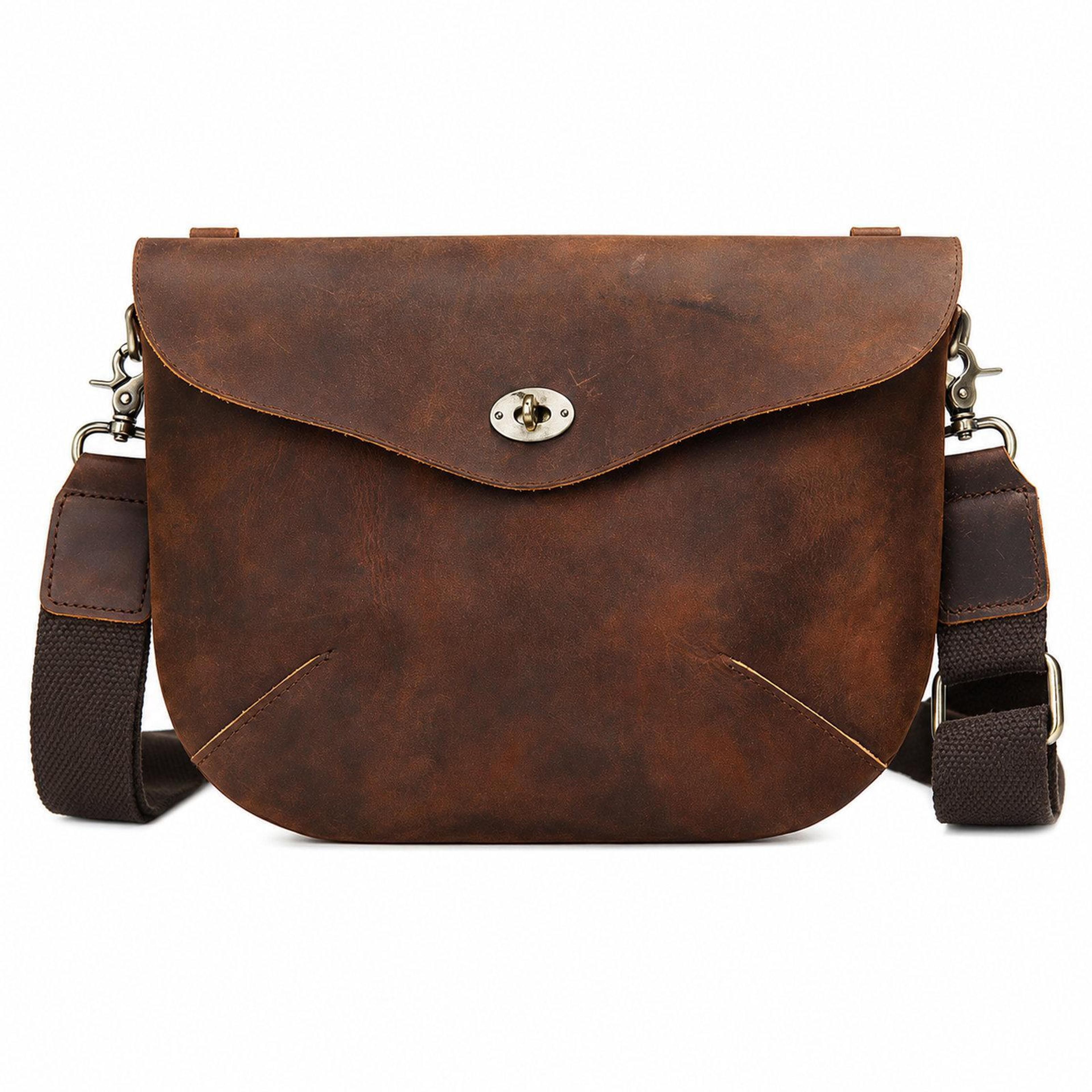 vintage leather crossbody bag with wristlet and multiple pockets