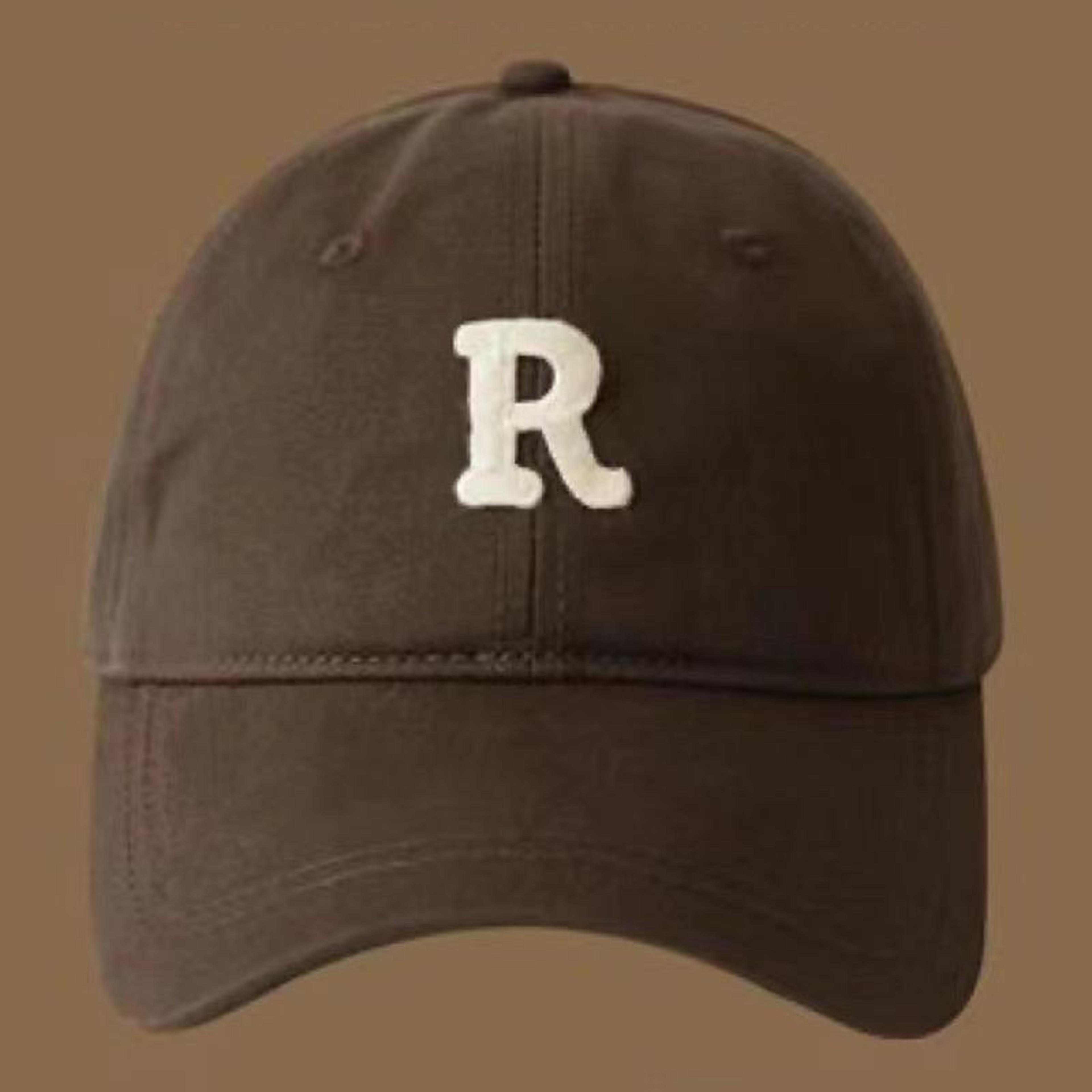 large cap baseball hat with r letter design and wide brim