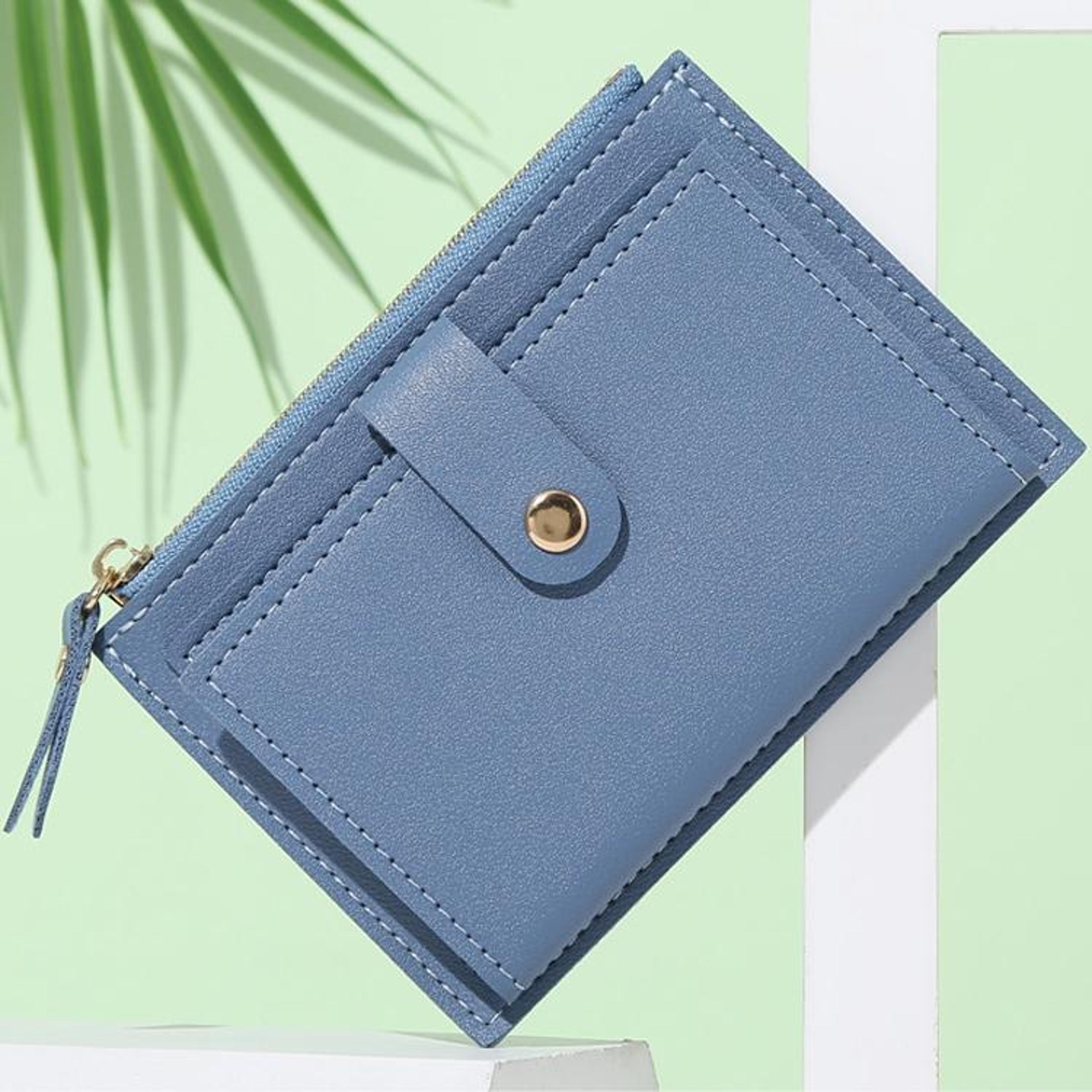 womens small wallet with crocodile pattern and metal buckle