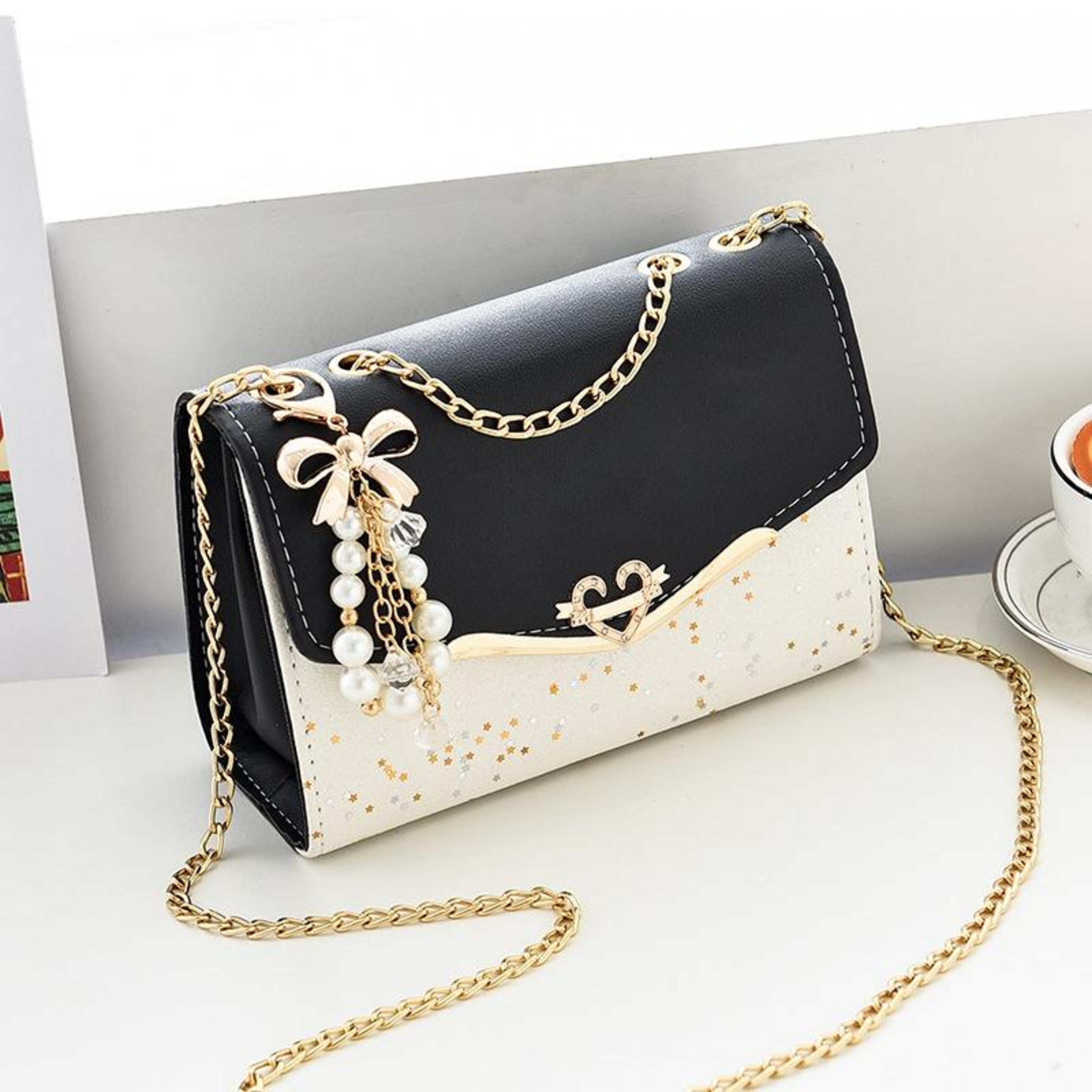 womens sequin shoulder bag with chain strap and heart decoration