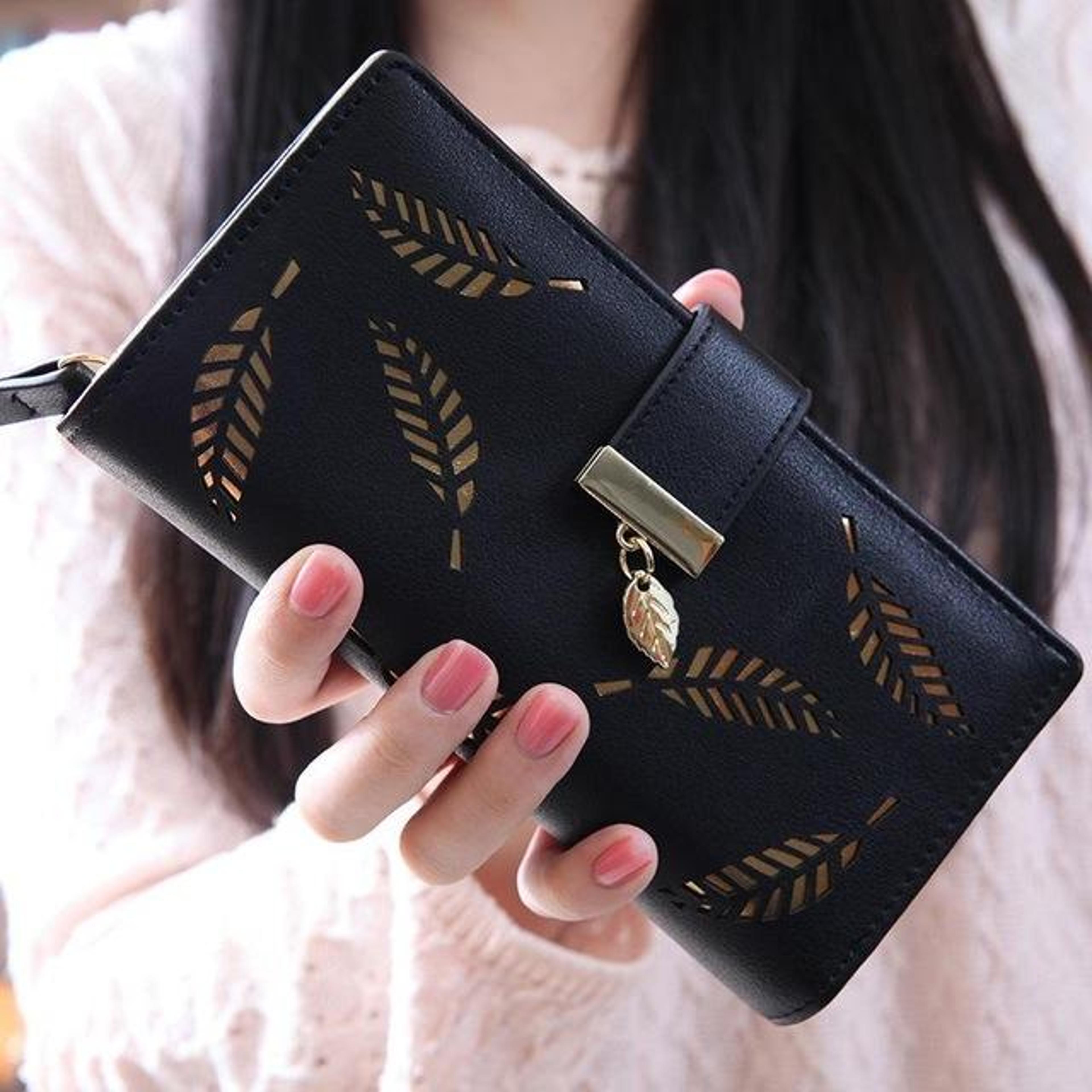 womens long pu leather wallet with hollow leaf design and zipper closure