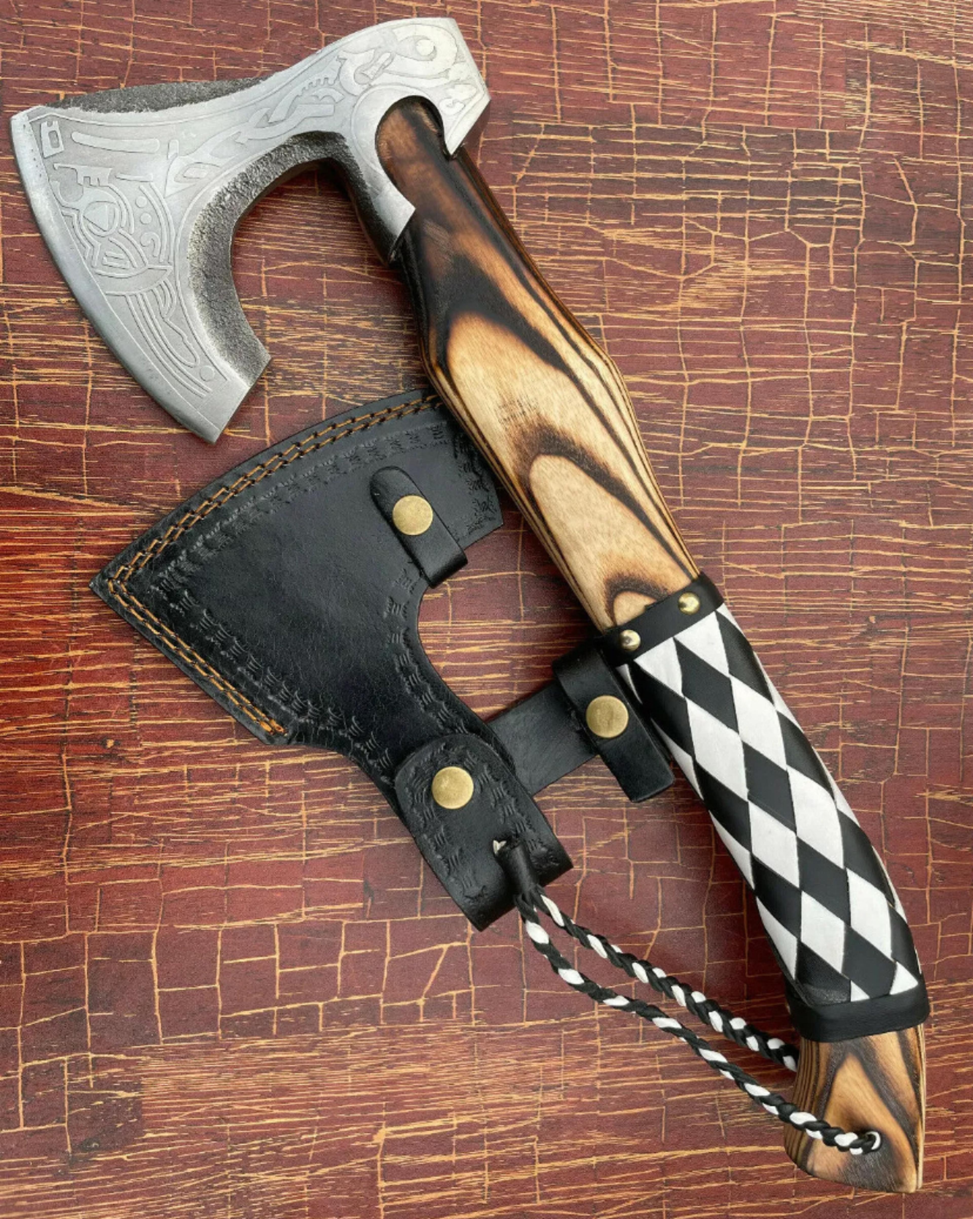 custom handmade high carbon steel forged axe etched engraved ash wood handle with white leather wrapping and sheath.