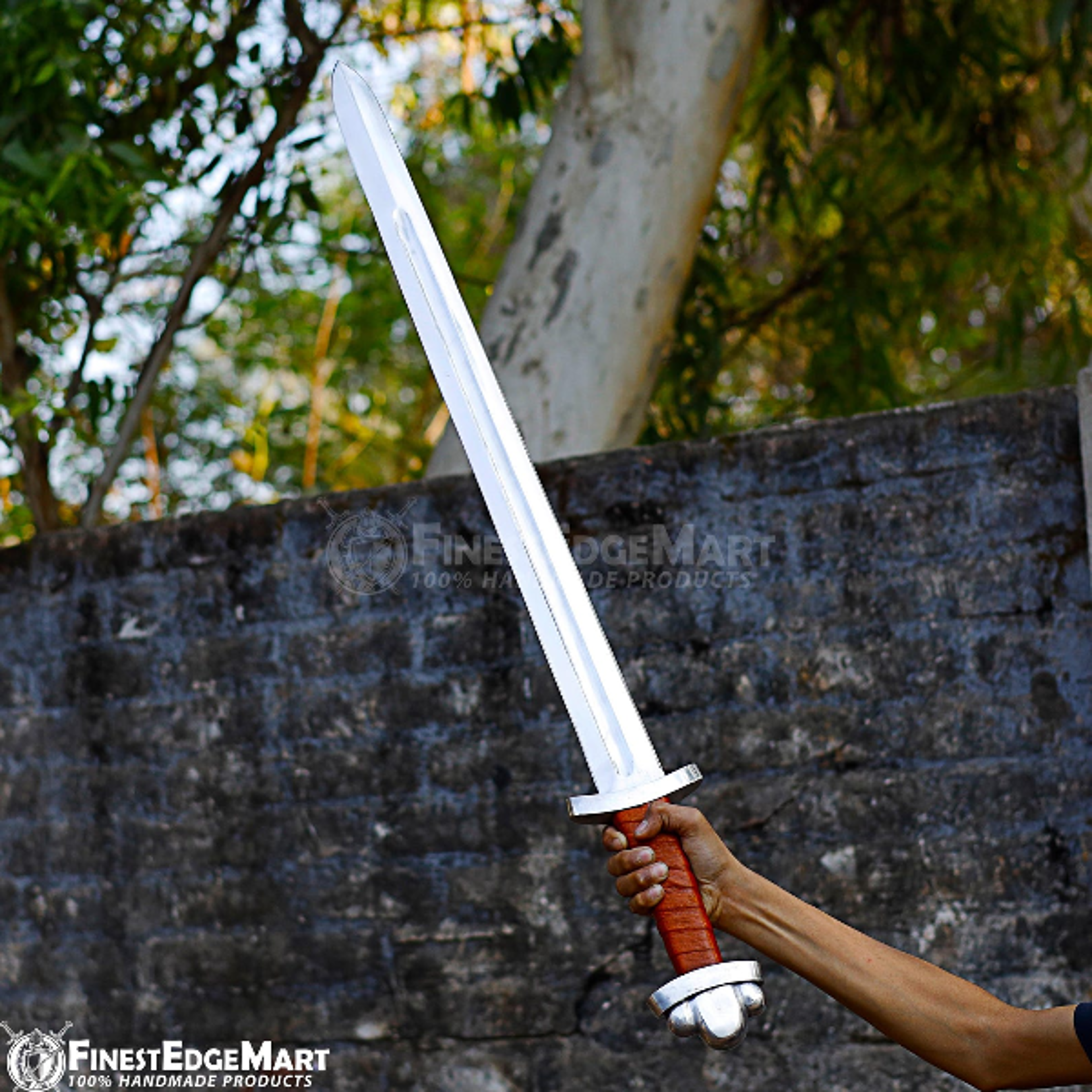 handcrafted carolingian viking sword with polished steel blade and leather grip for decorative display