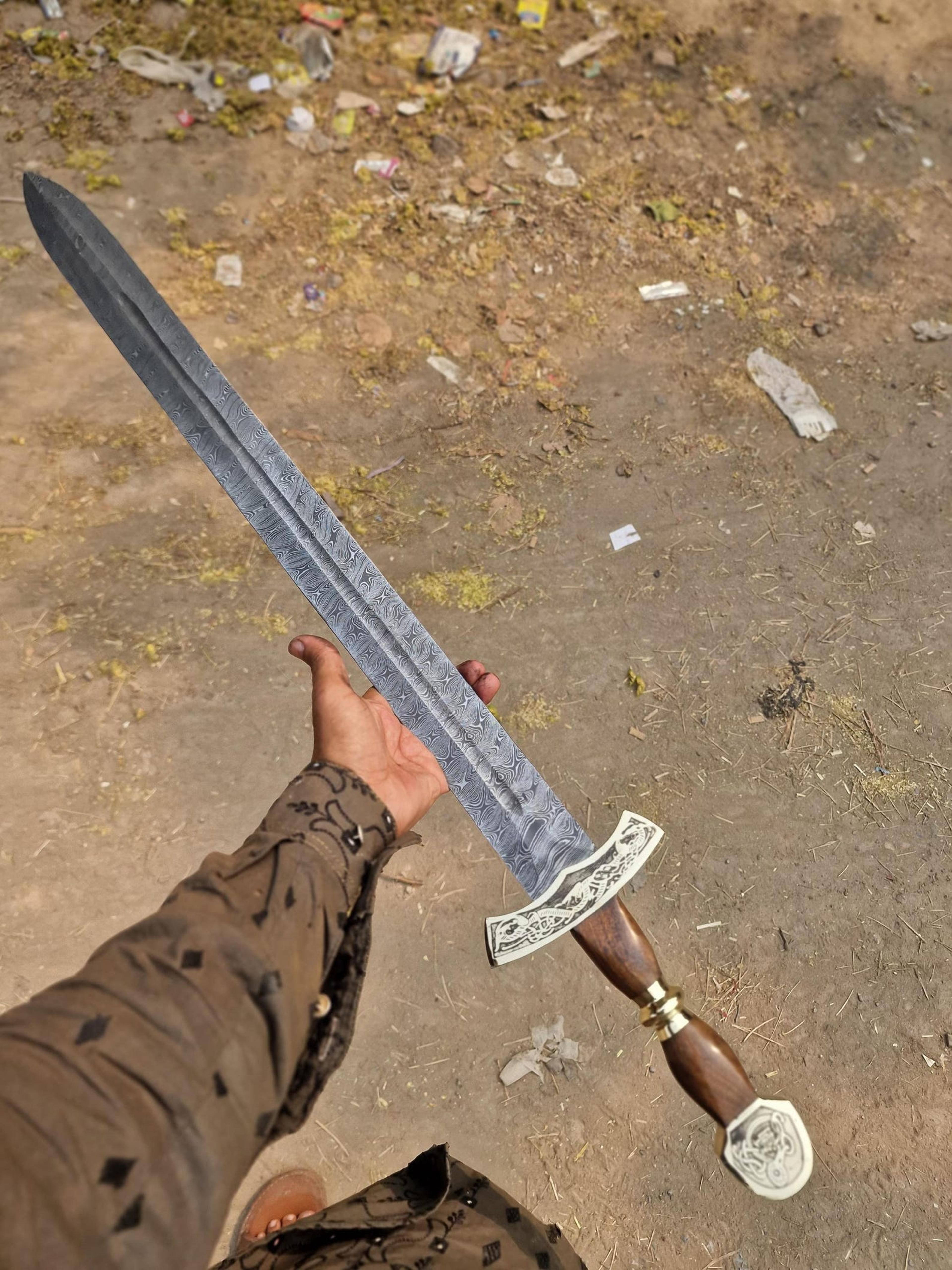 40in damascus medieval longsword with patterned steel blade, wood grip & engraved silver guard