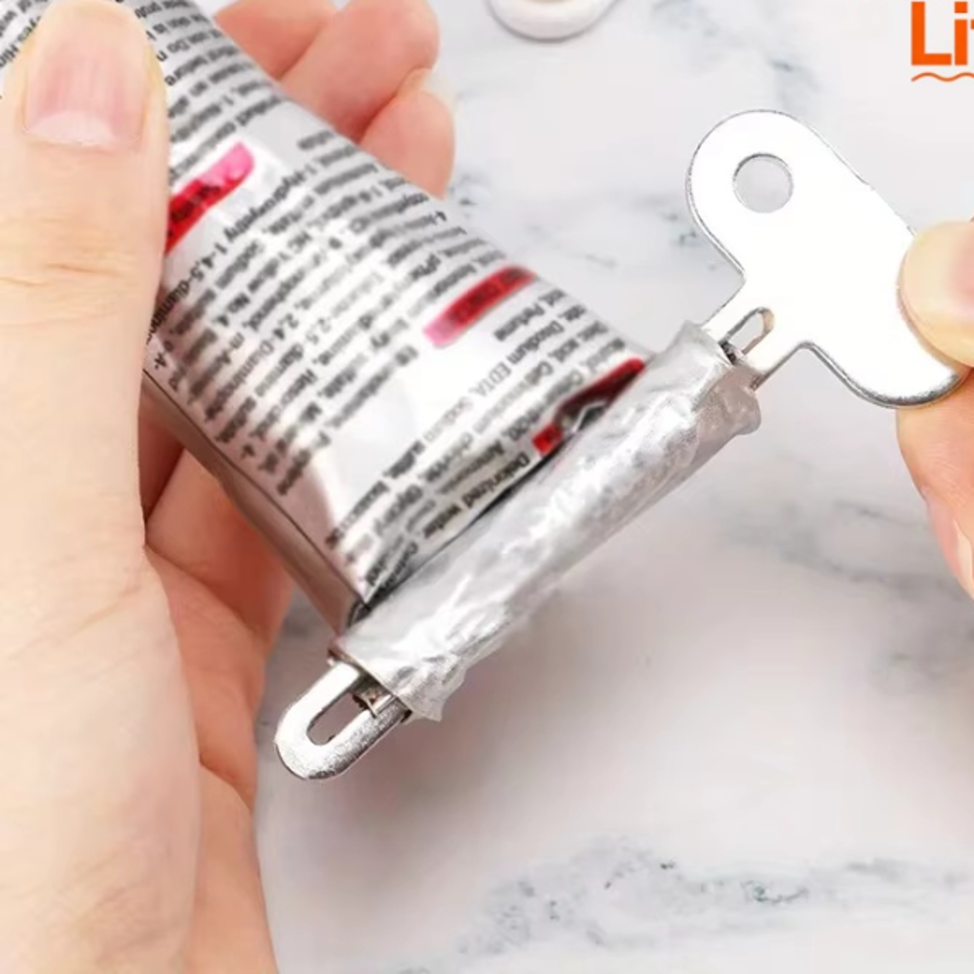 manual toothpaste dispenser, cast iron tube squeezer, metal tube wringer, bathroom accessories, no power required