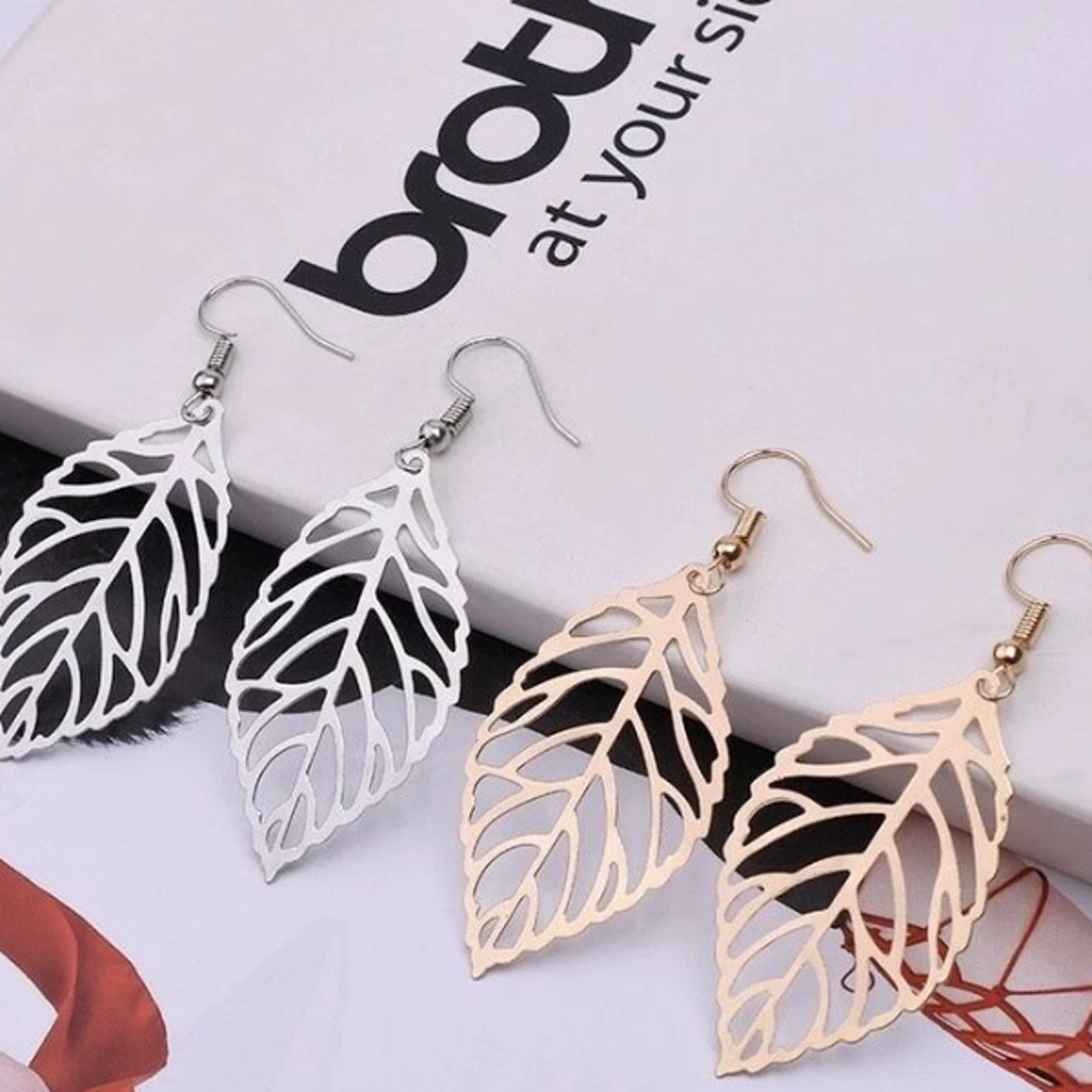 bohemian retro earrings for women, fashion jewelry with hollow leaf tassel designs