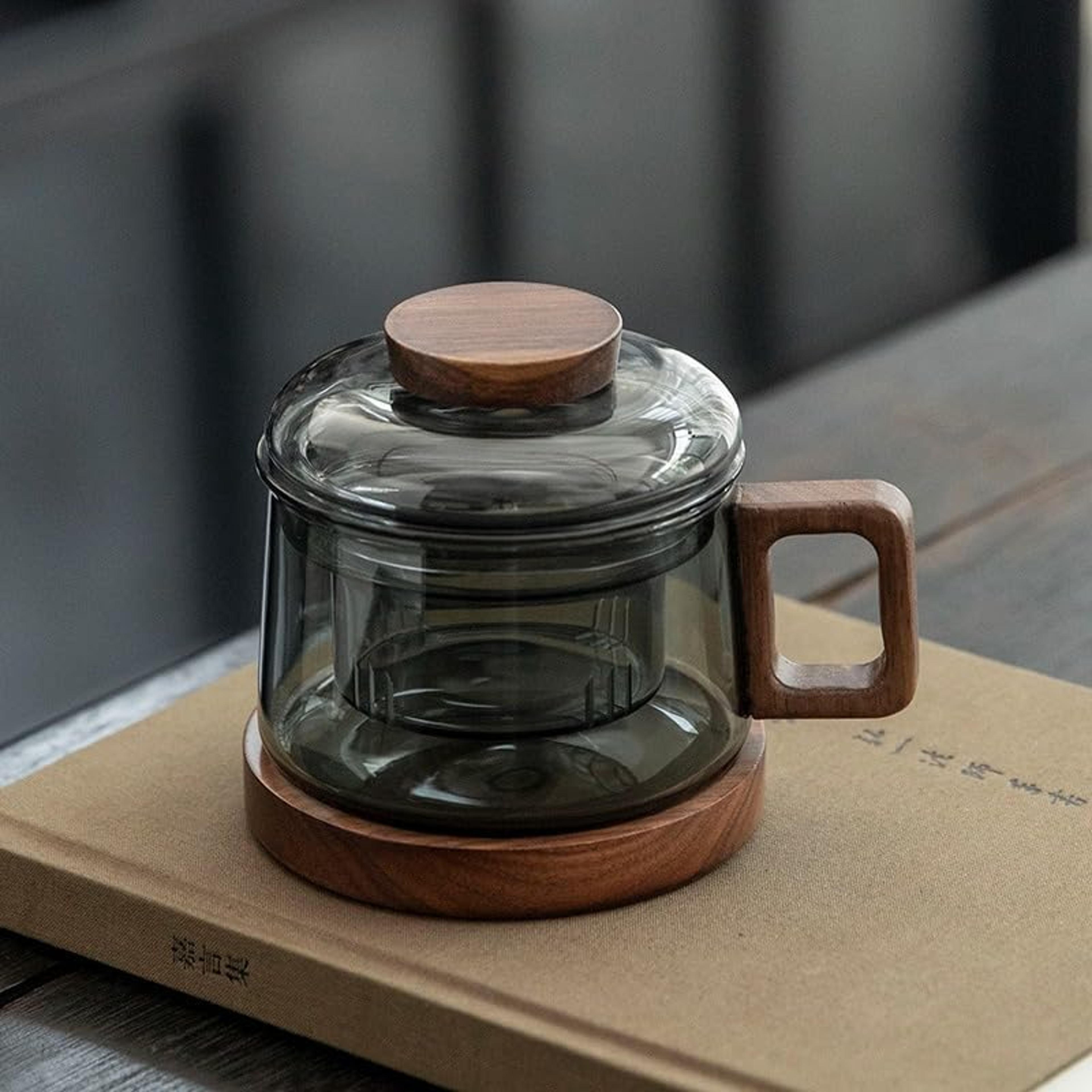 reusable multifunctional glass tea cup with filter, heat resistant, ideal for loose leaf tea and fruit infusions