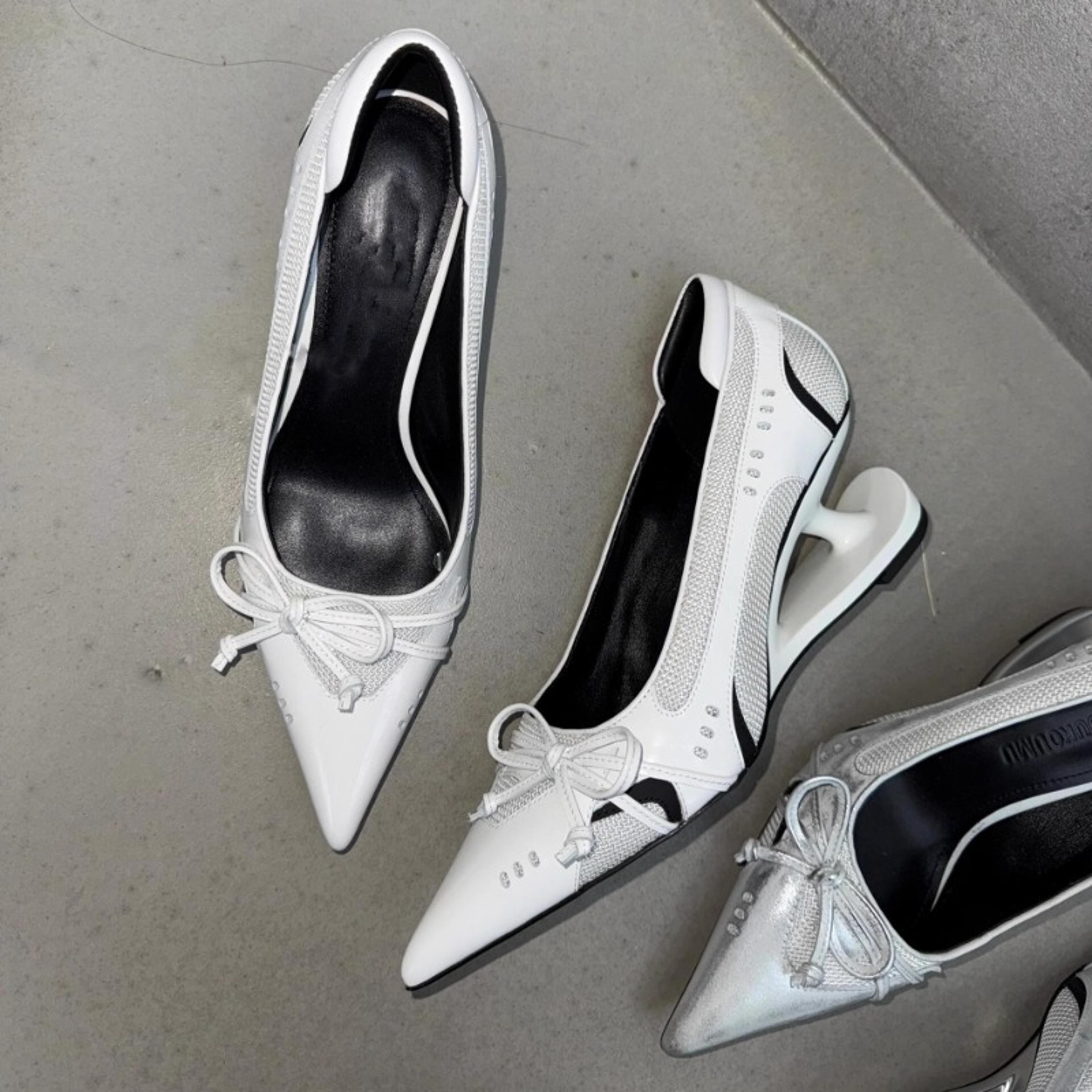 womens pointed toe mary jane pumps with bow detail and sculptural heels