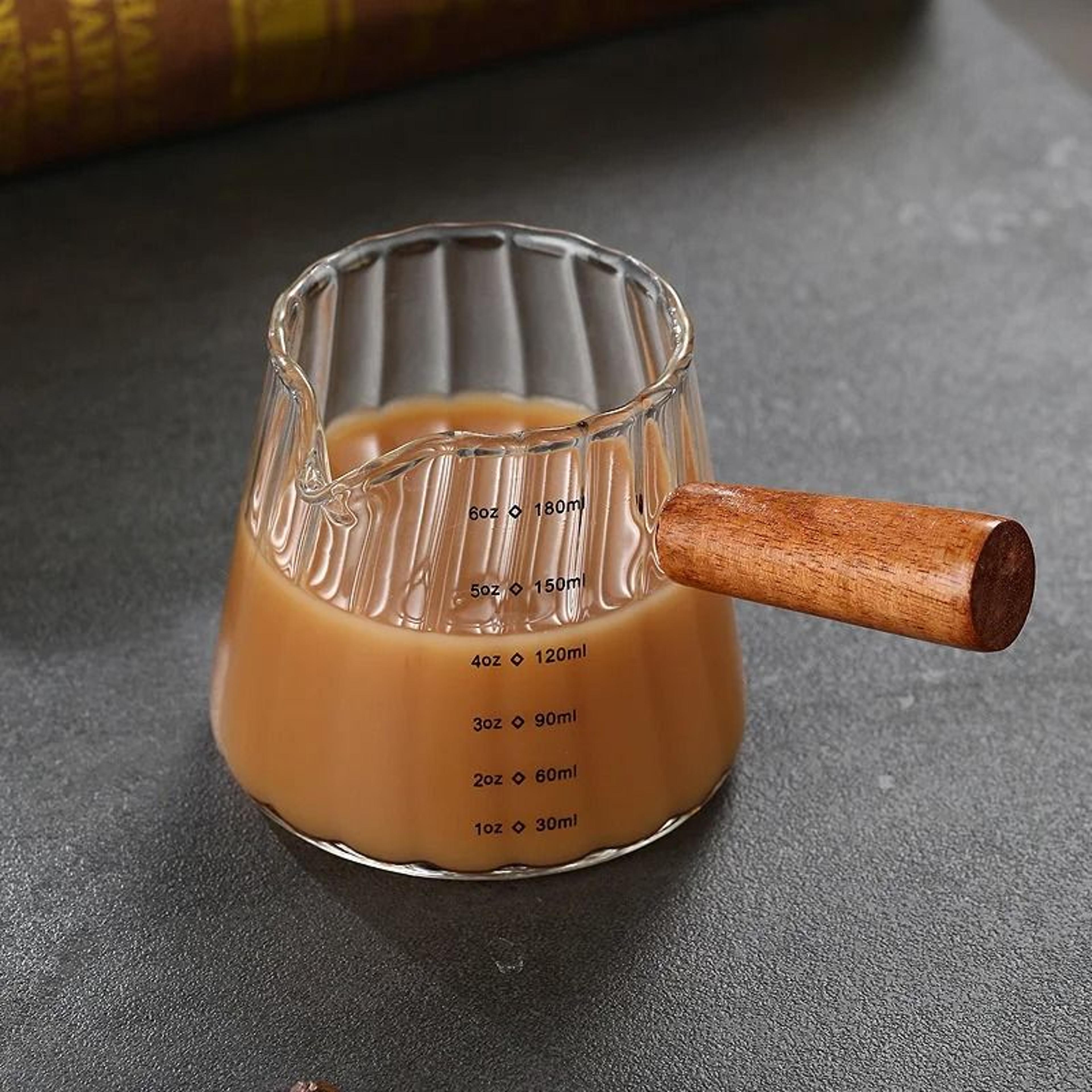 glass espresso measuring cup with wooden handle