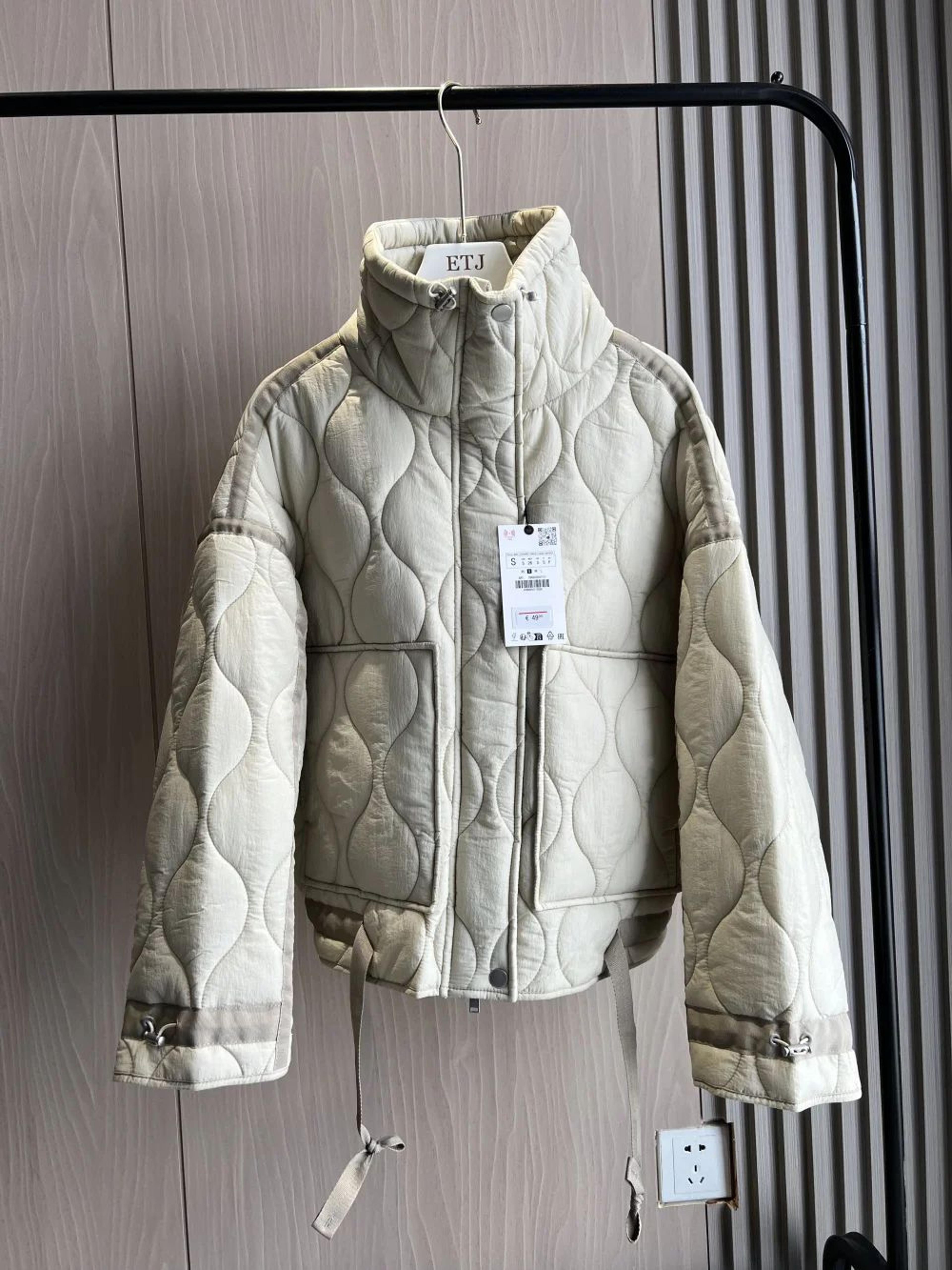 women's quilted high neck jacket with drawstring