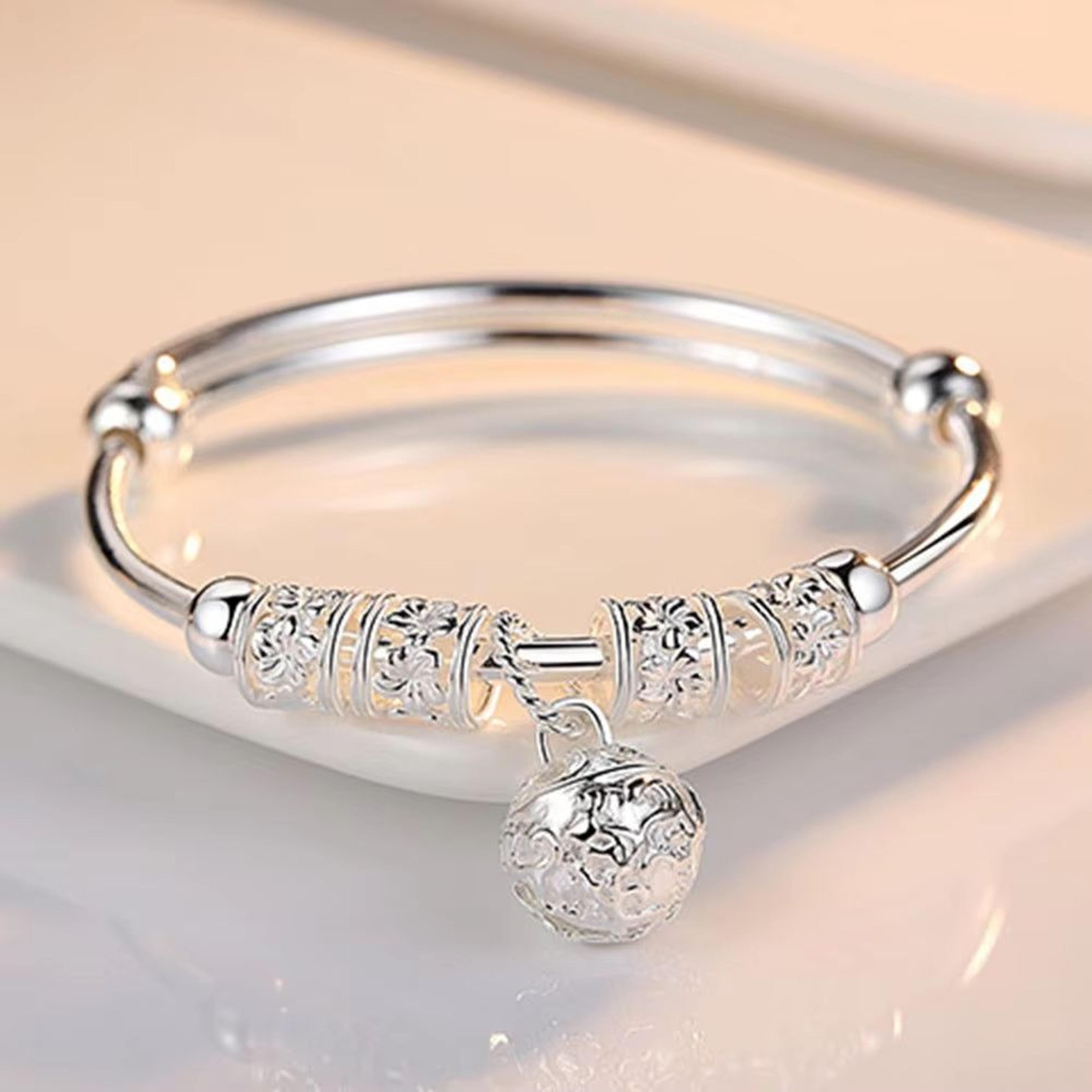 fine silver hollow bells adjustable bangle bracelet for women