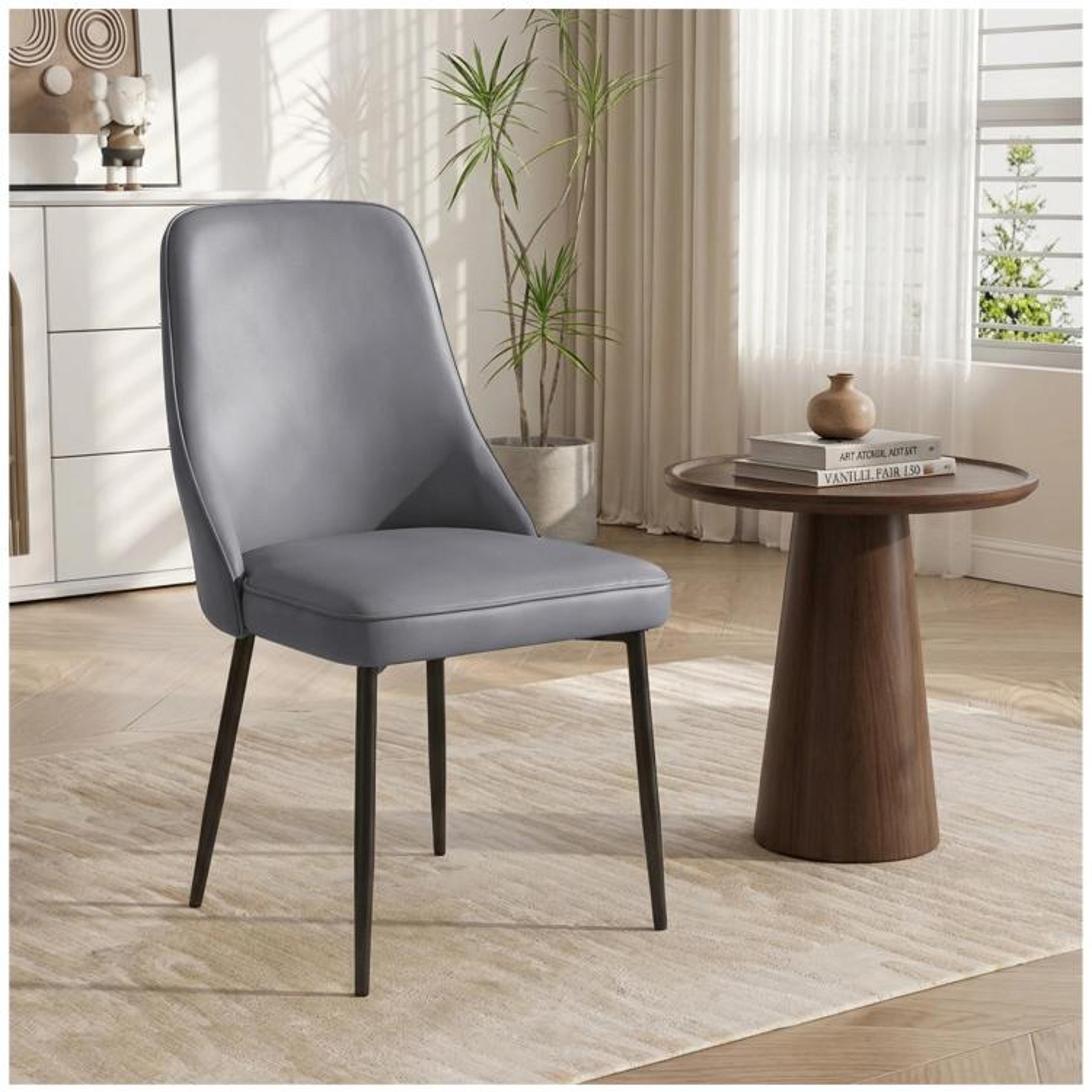 Modern Brown Faux Leather Dining Chair With Curved Back And Metal Legs 1